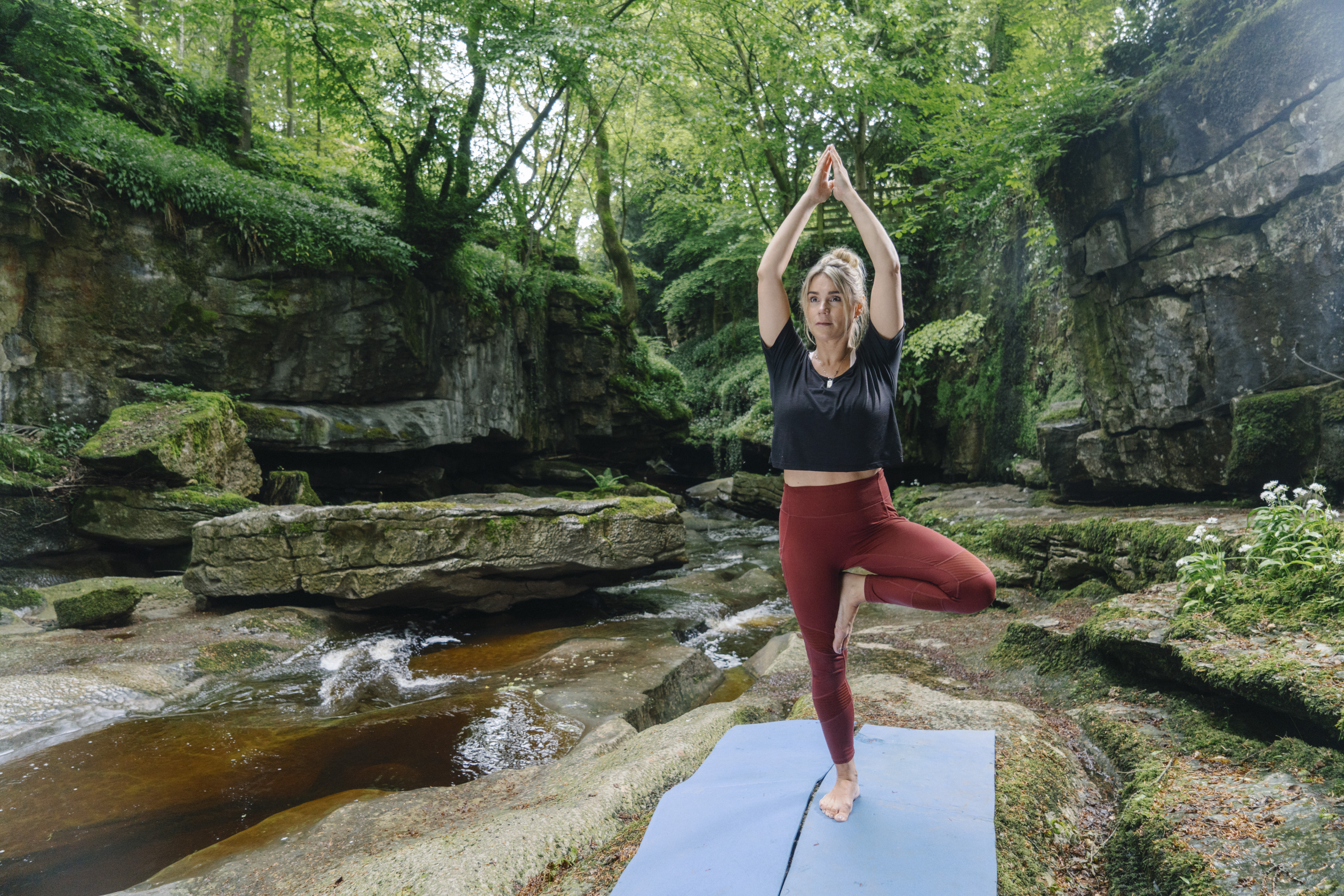 Adult doing Yoga at How Stean Gorge - credit Tom Arber and Visit North Yorkshire