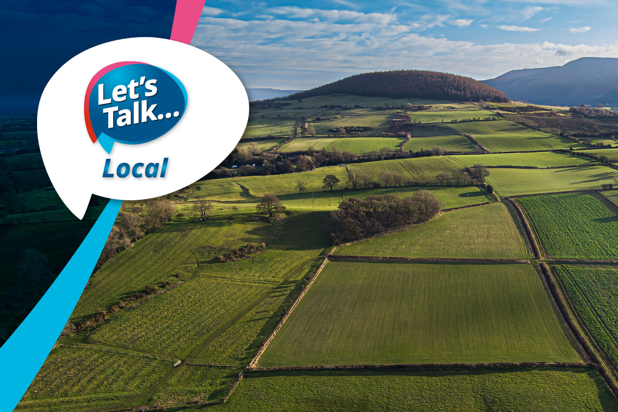 The Let's Talk Local logo over a scenic picture of green fields in North Yorkshire
