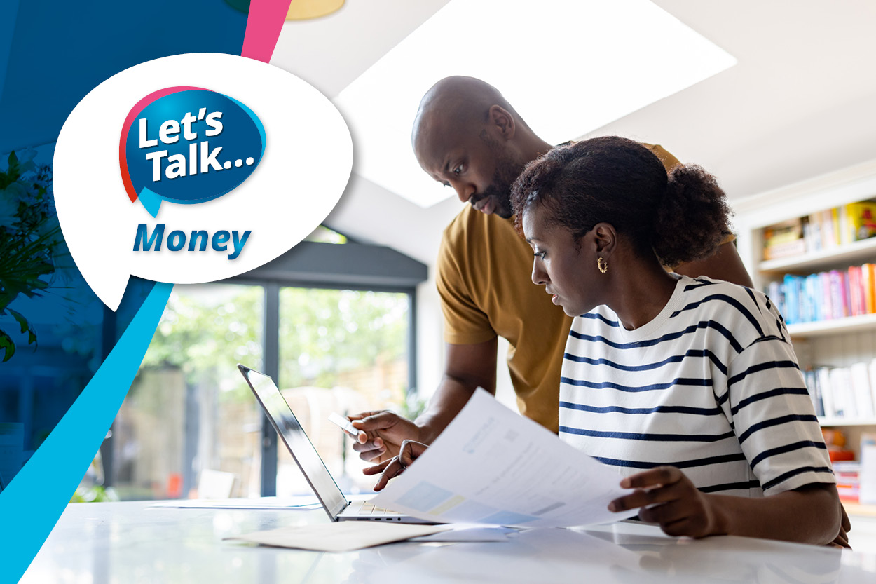 The Let's Talk money logo over a picture of a couple looking at papers and a laptop