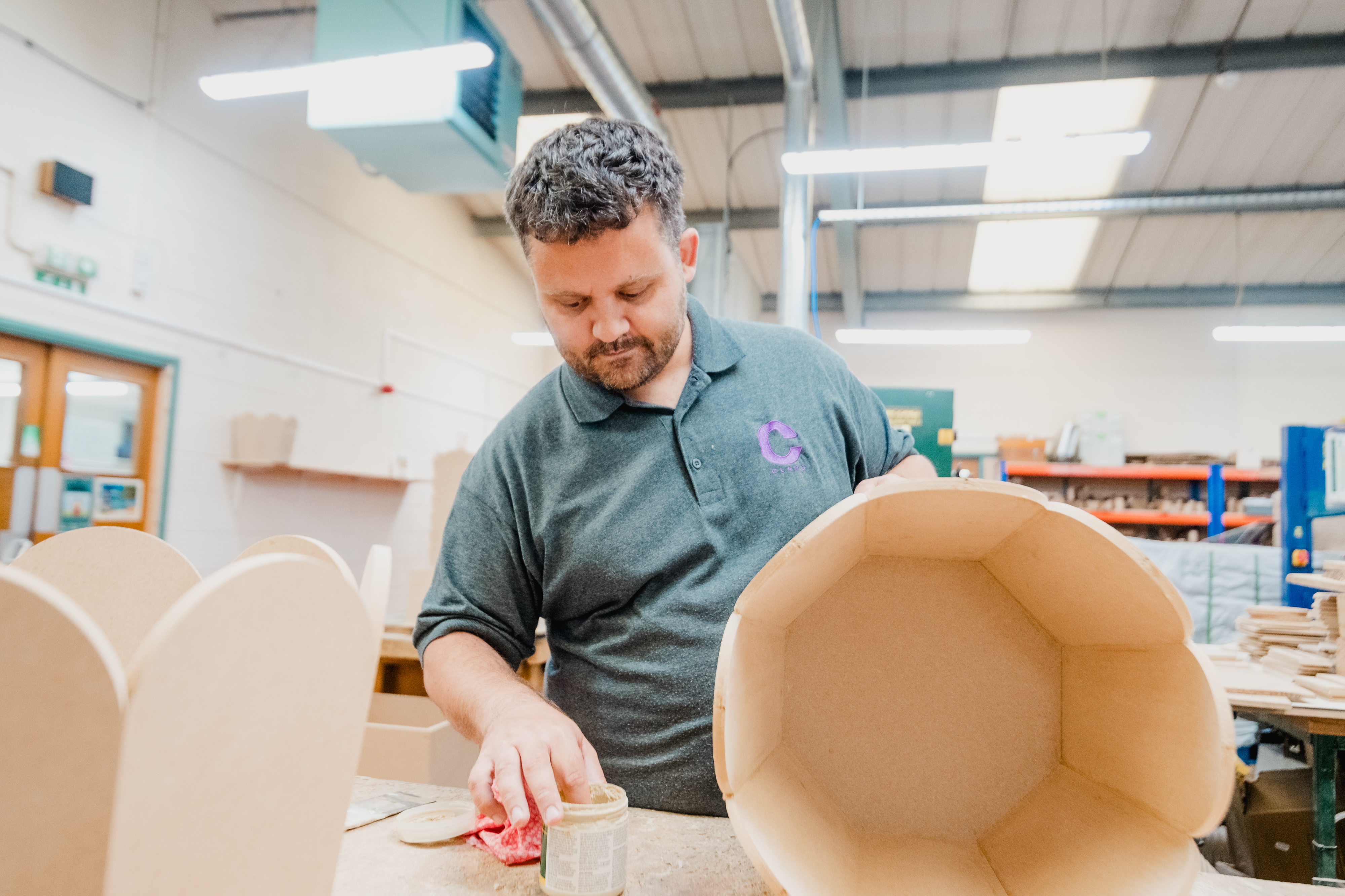 An adult working in a workshop