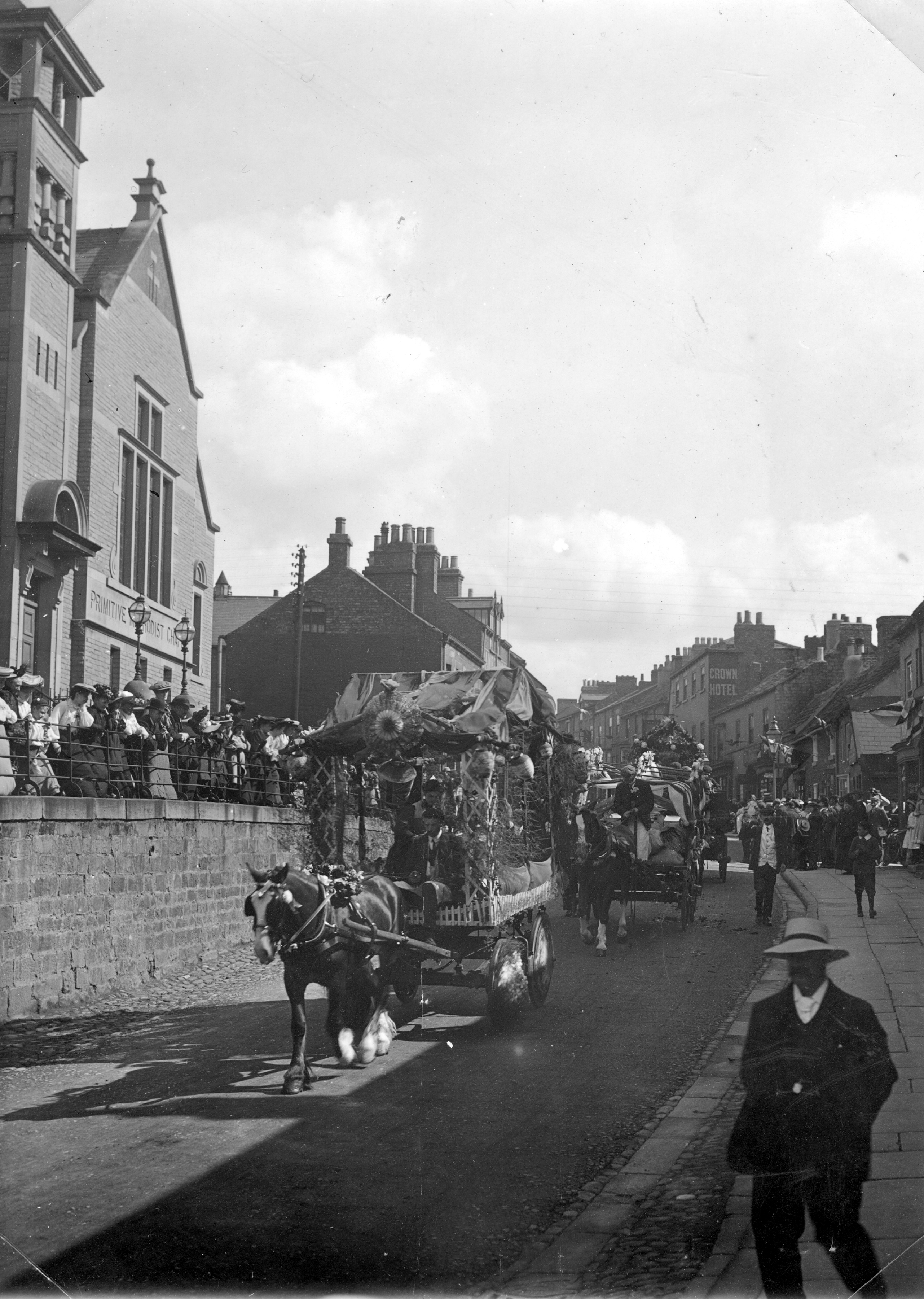 A tradesmen’s procession on Pump Hill in Knaresborough in the early 20th century