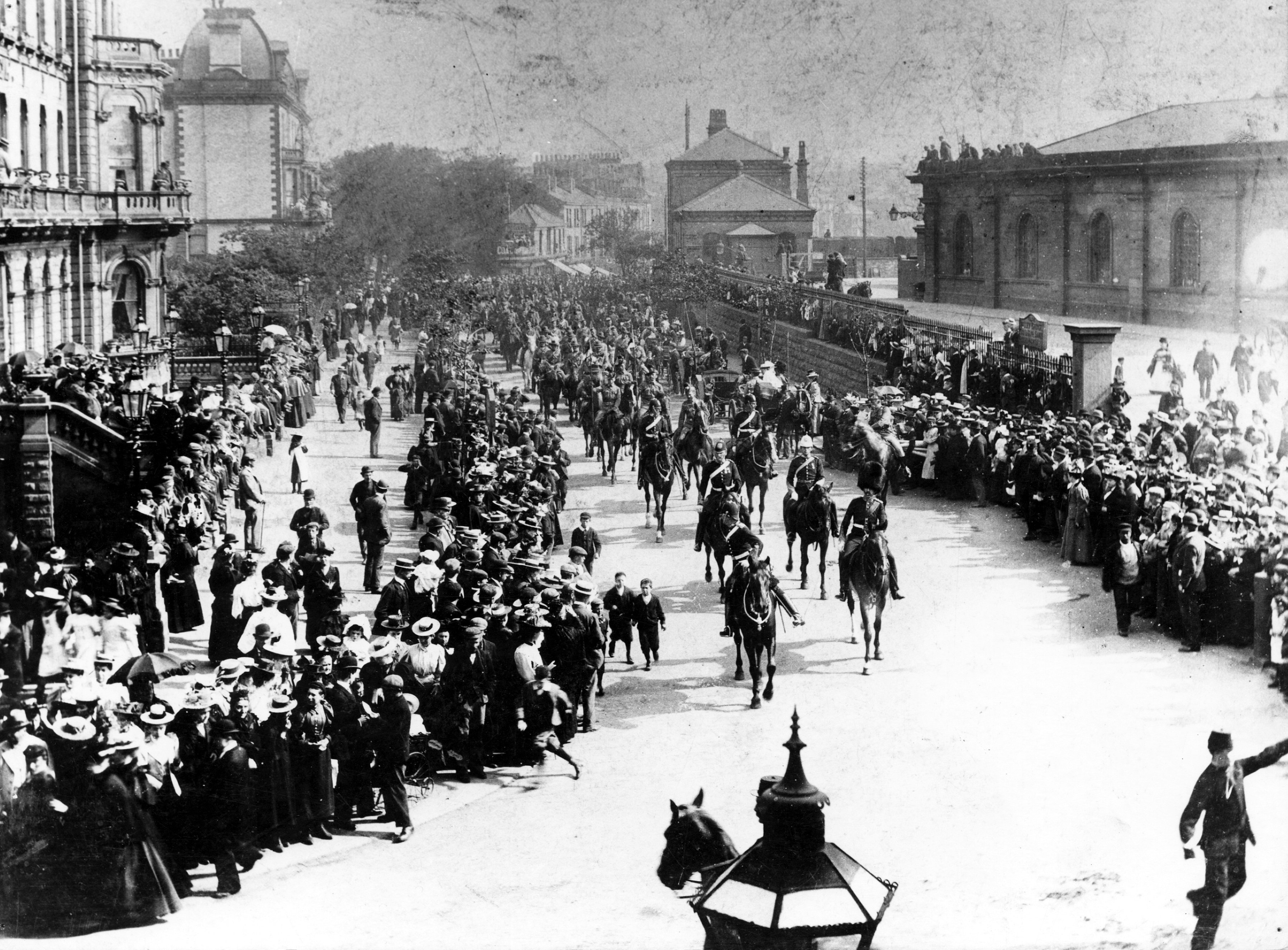  A military parade in Scarborough passes between the Pavilion Hotel and the Railway Station