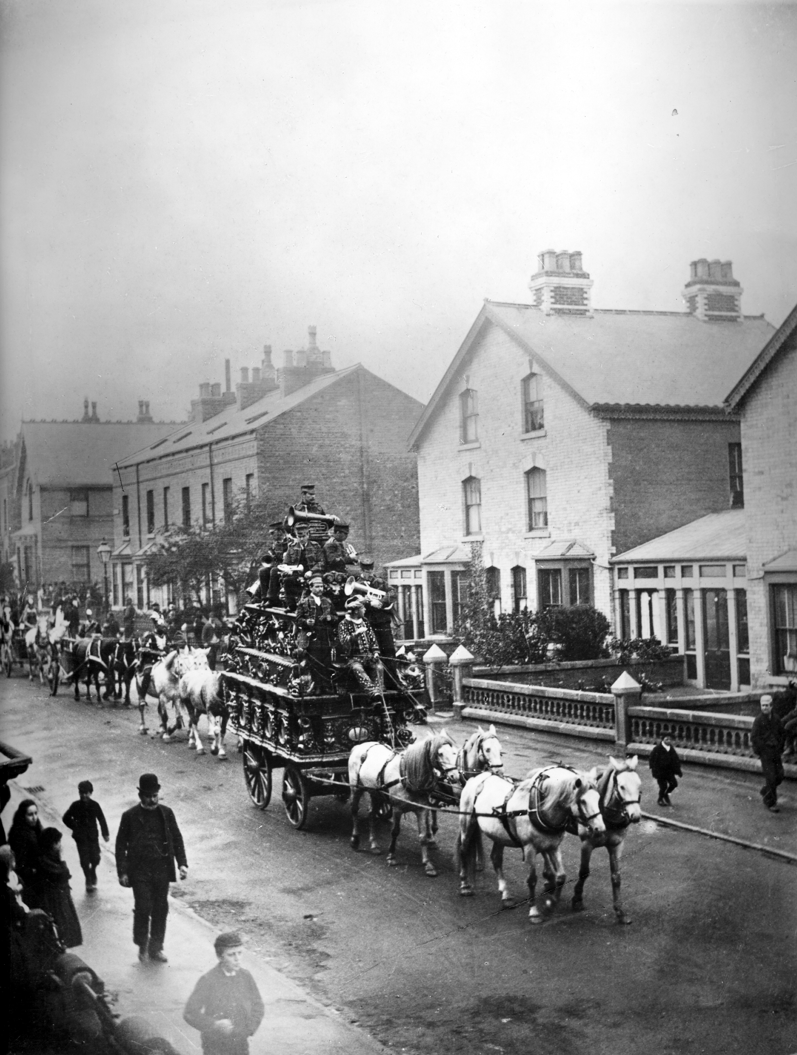 A circus parade proceeding along Prospect Road in Scarborough to advertise its presence in the town during the early 20th century