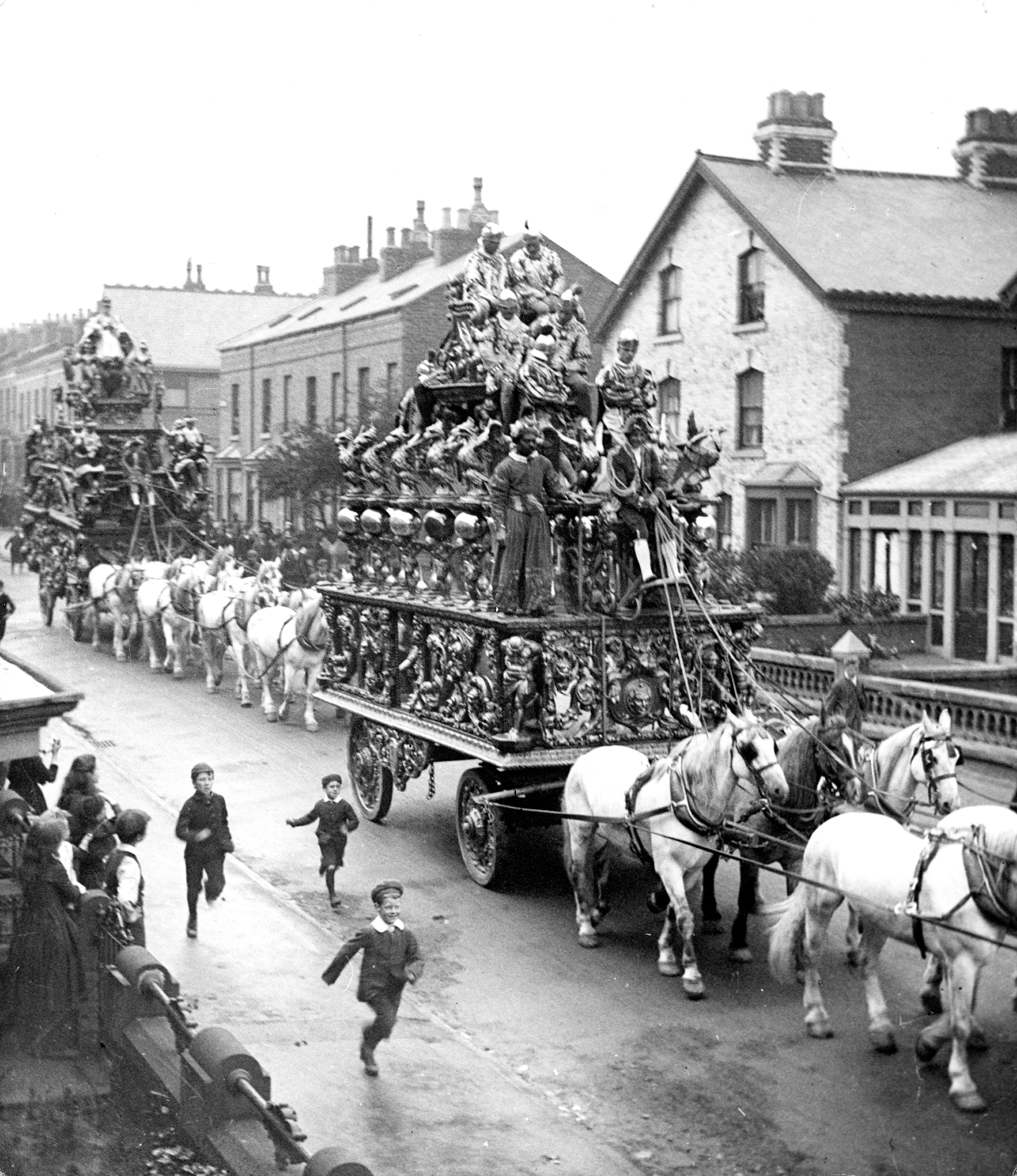 Black and white photo showing a circus parade proceeding along Prospect Road in Scarborough