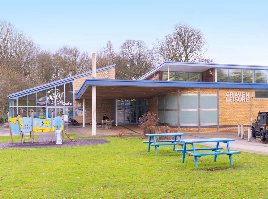 An external view of the front of Skipton Leisure and Wellbeing Hub and the Revive Cafe
