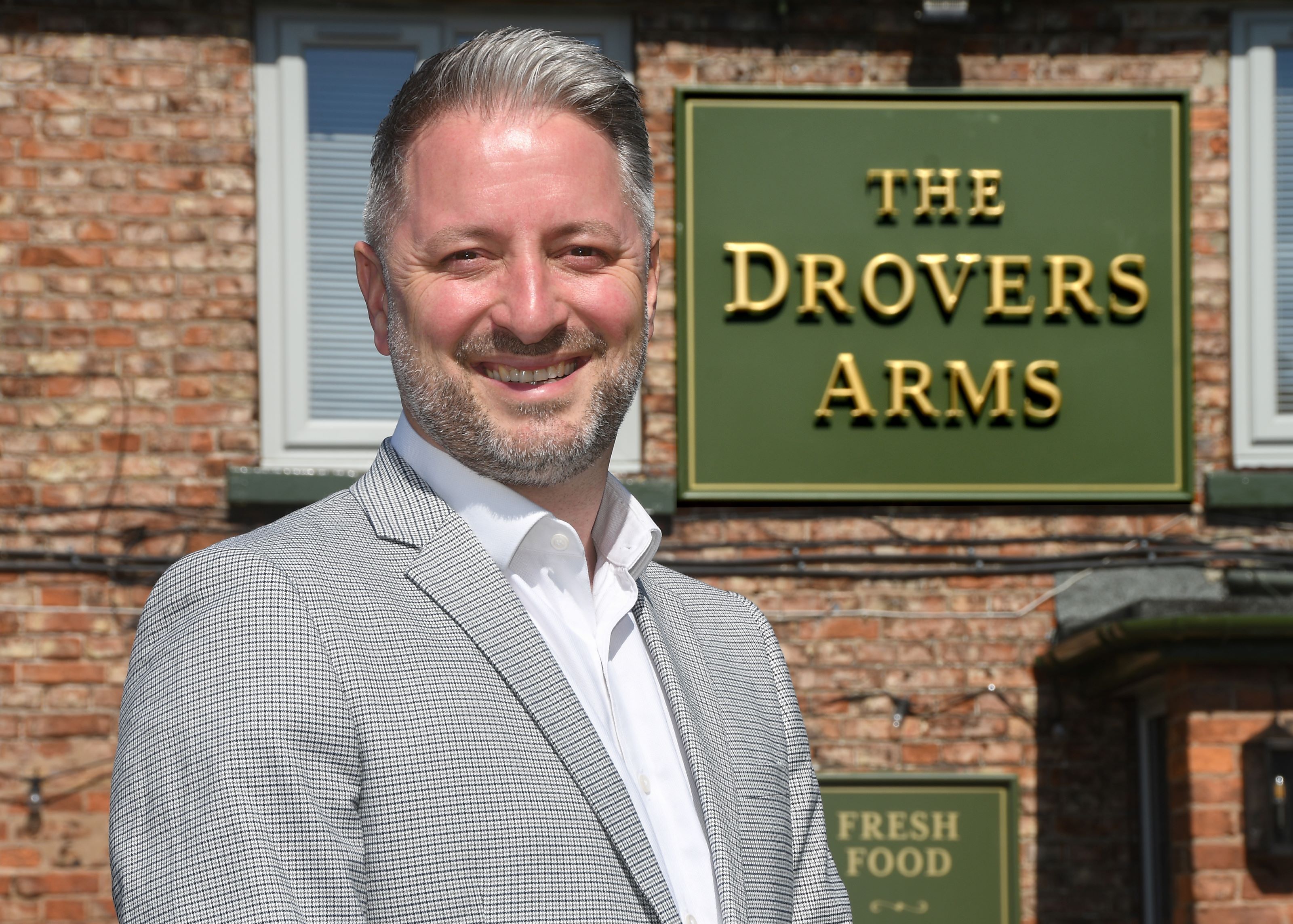 A man outside The Drovers Arms