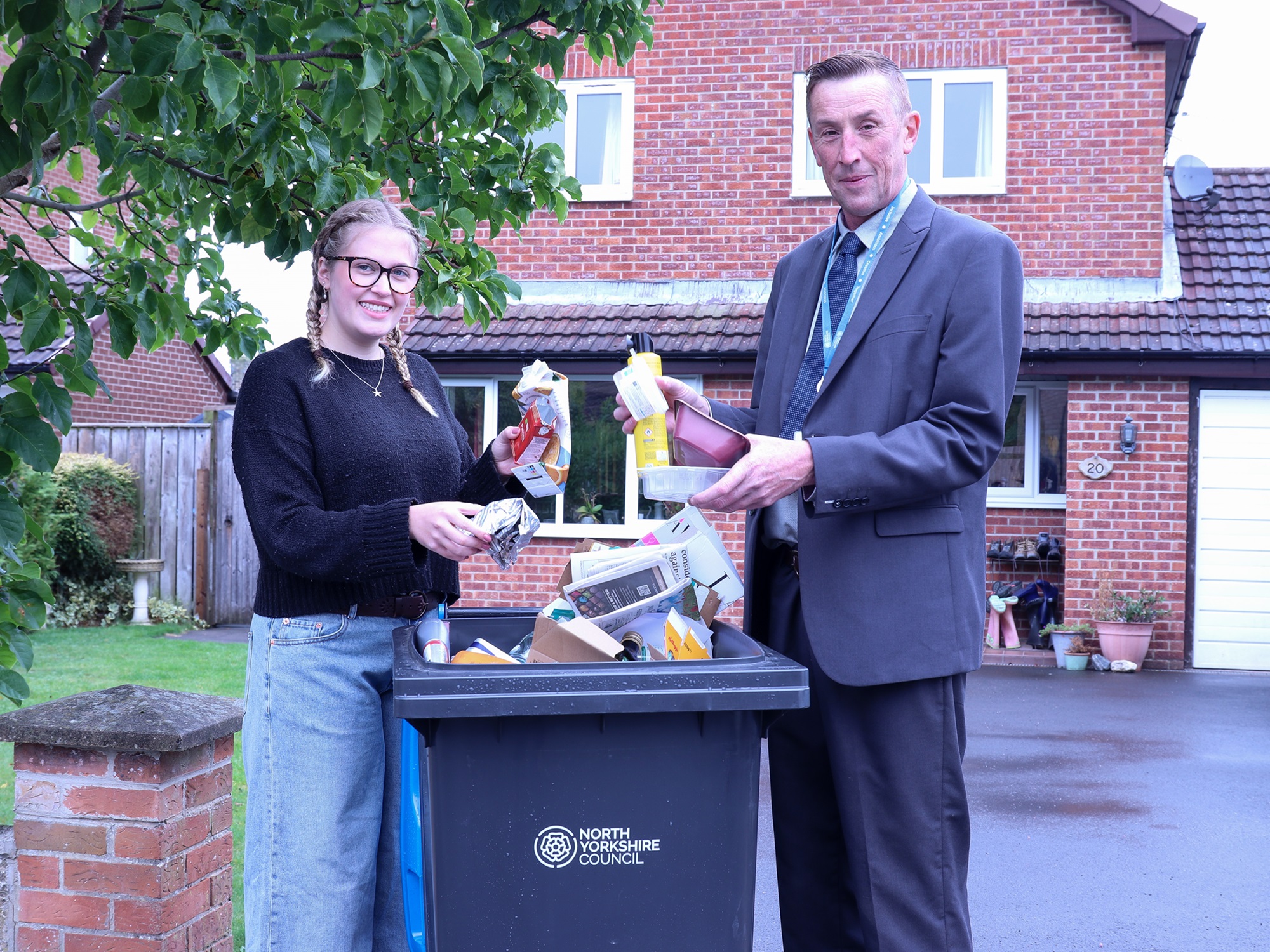 Cllr Richard Foster with North Yorkshire resident, Alexis Flint, demonstrating what can be recycled. 