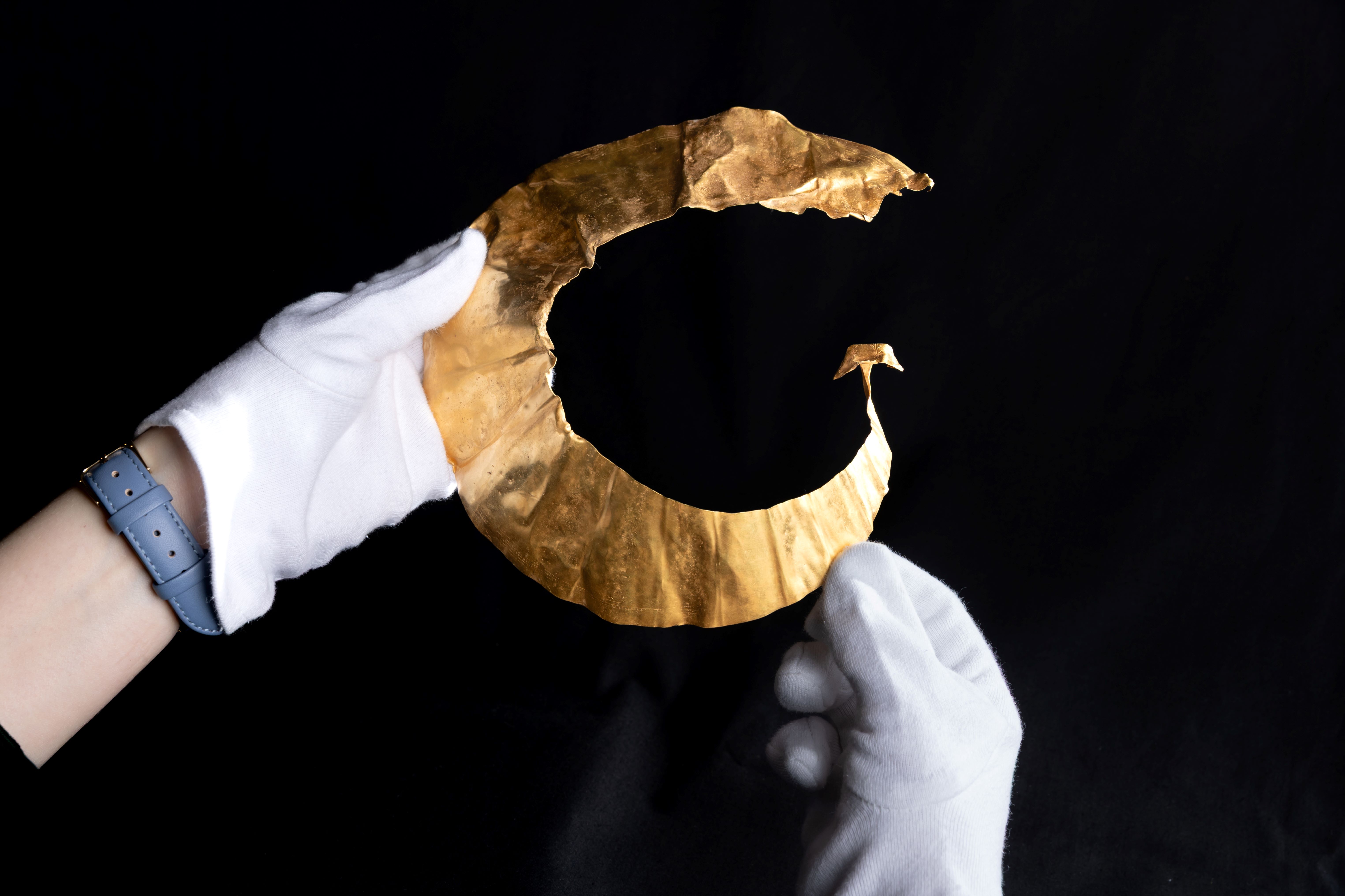 Image of the gold lunula, a nationally significant Bronze Age find.
