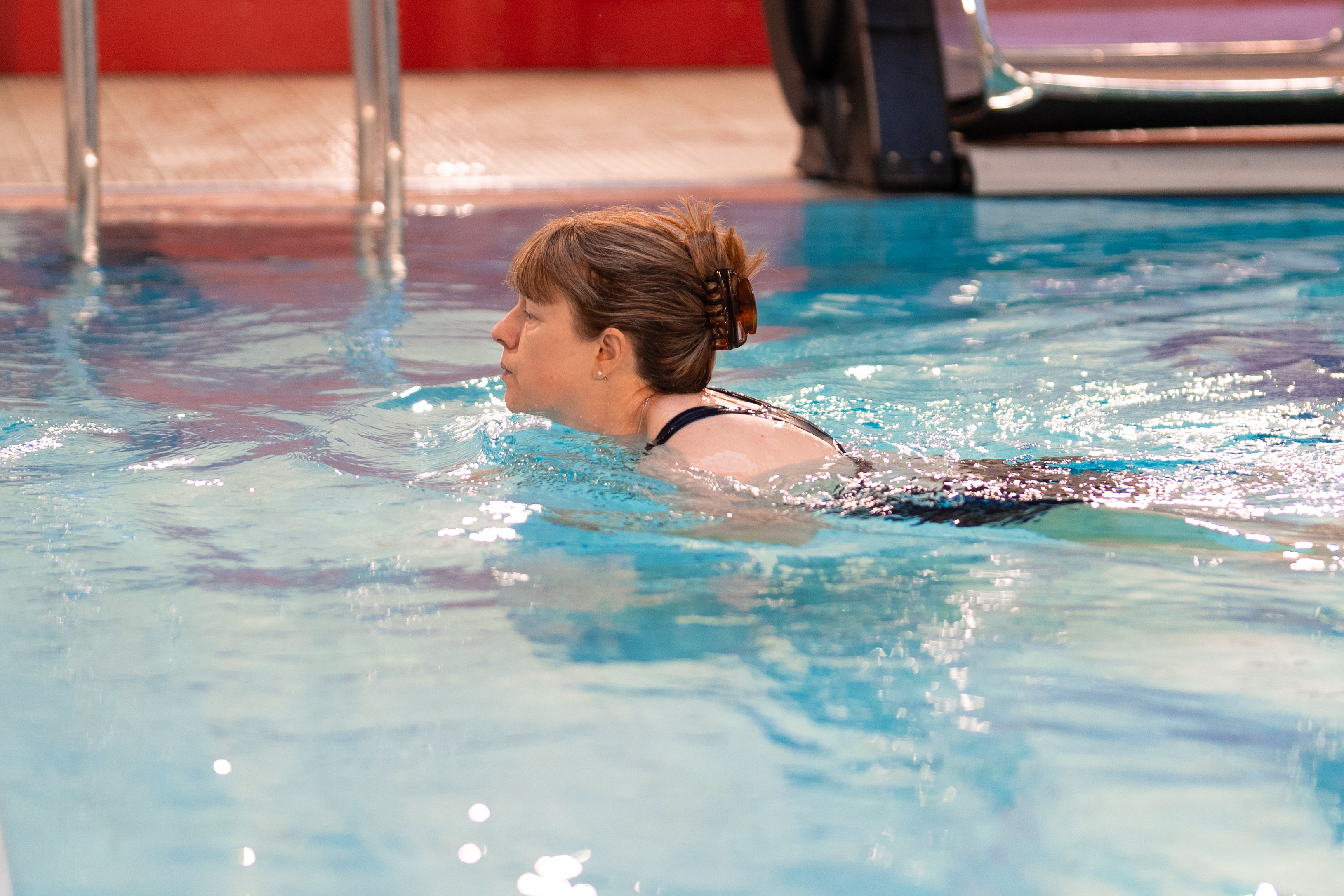 A woman swimming in the pool at Bedale Leisure and Wellbeing Hub