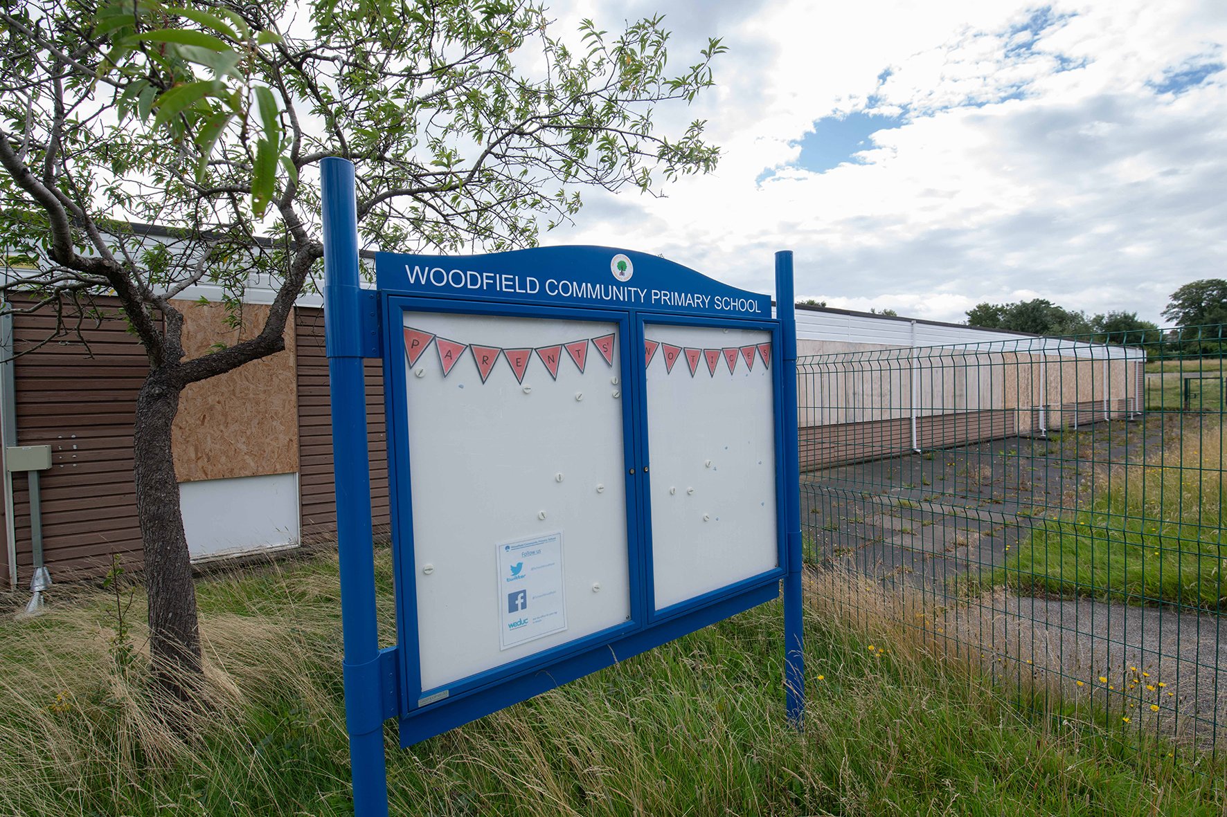 Sign outside Woodfield Community Primary School