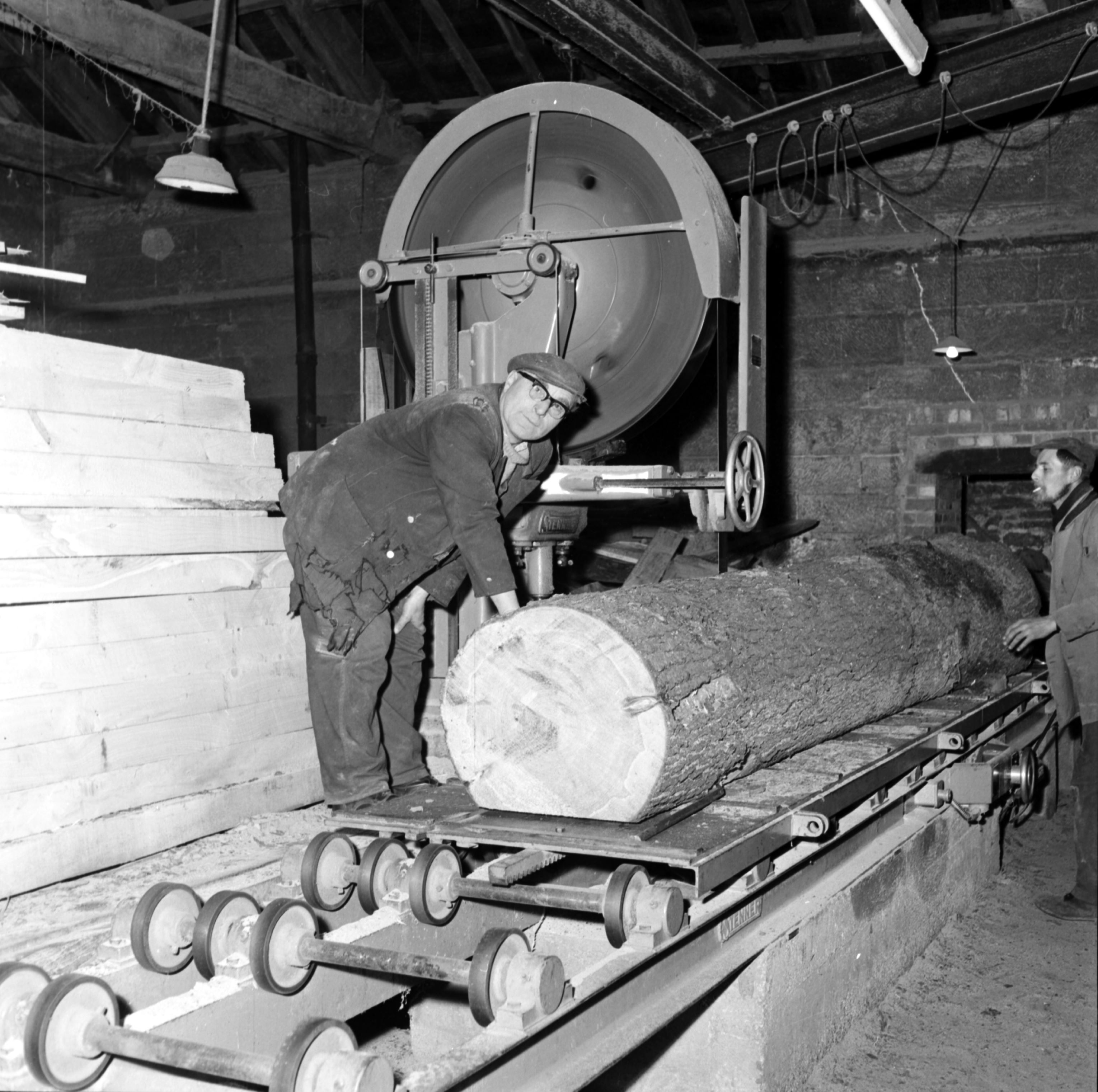 Working at the band sawmill on the Harewood Estate, 1960s. From the Bertram Unné photographic collection.