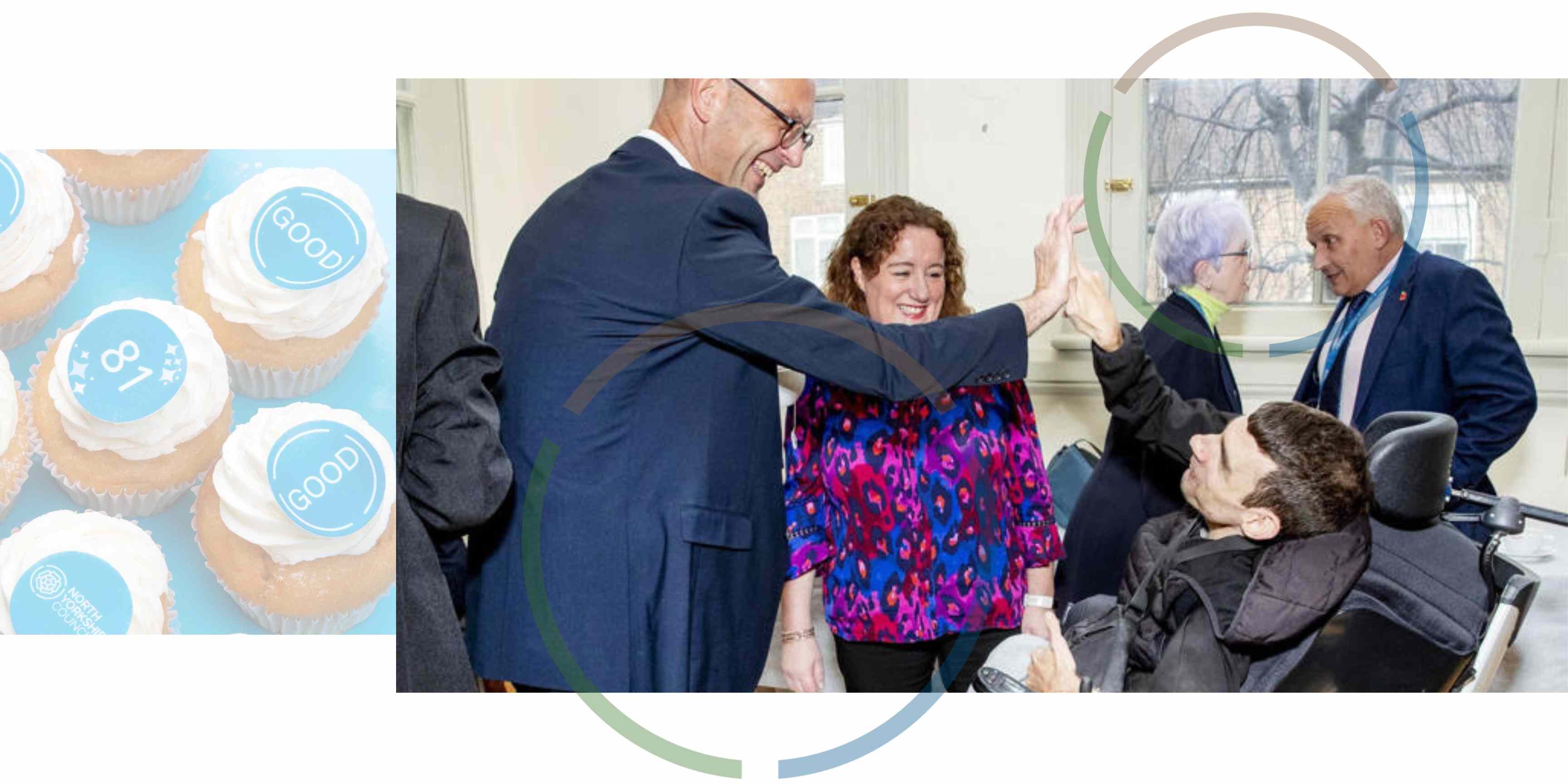 Group of people chatting and smiling with Richard Webb doing a high five to a person in a wheelchair