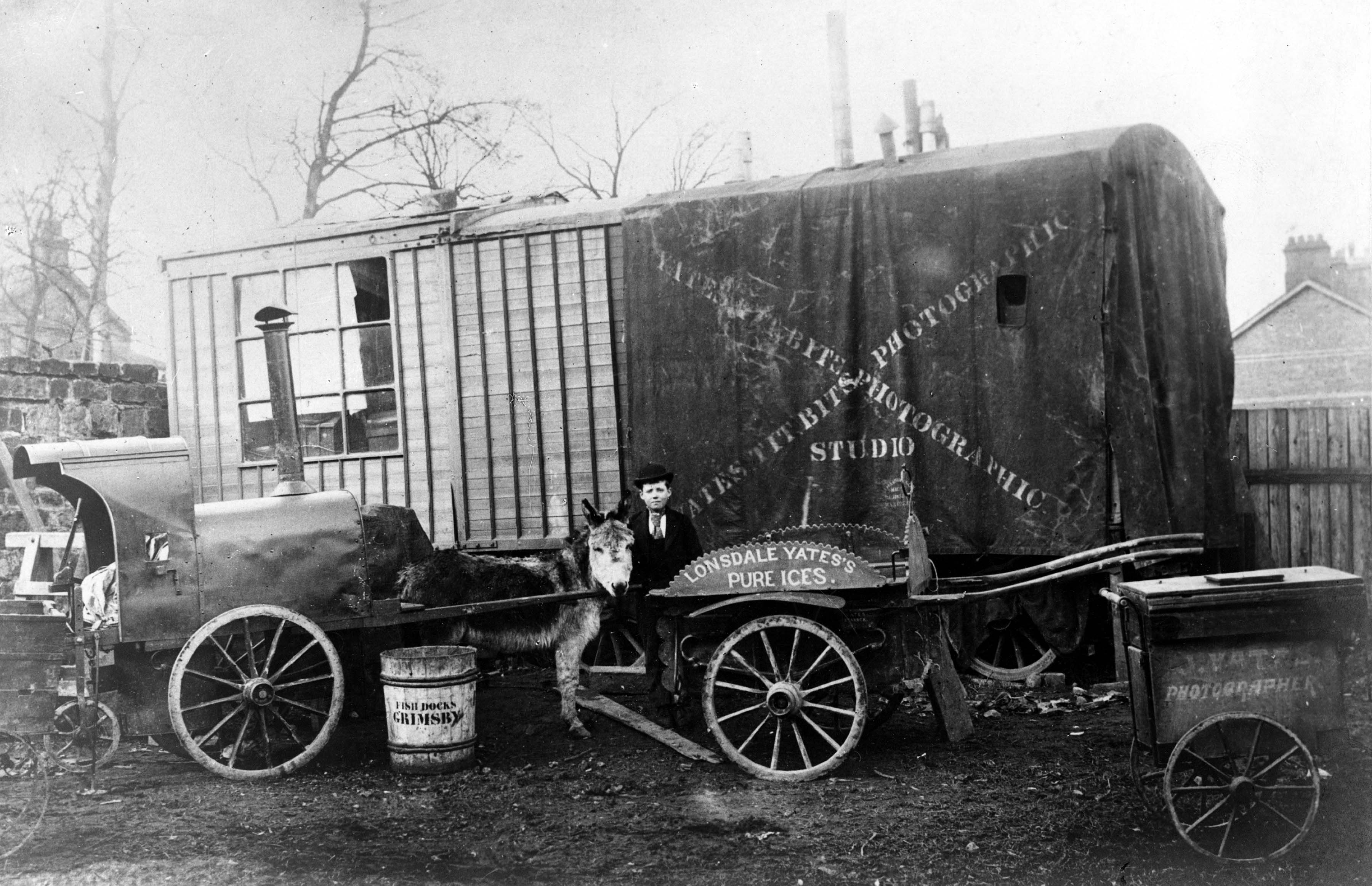 Various business carts belonging to Lonsdale Yates of Harrogate (early 20th century).