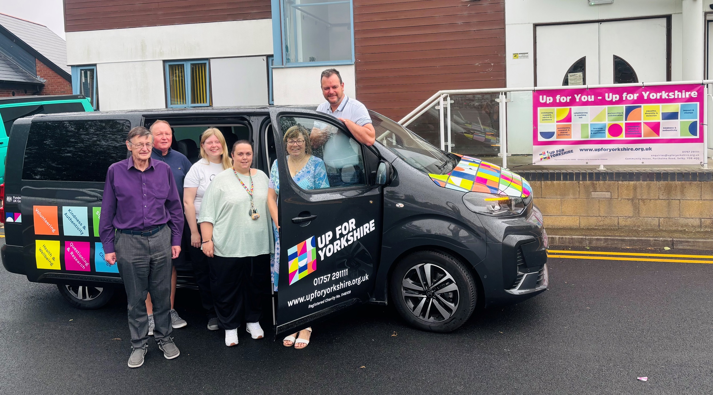 Six people with an electric van