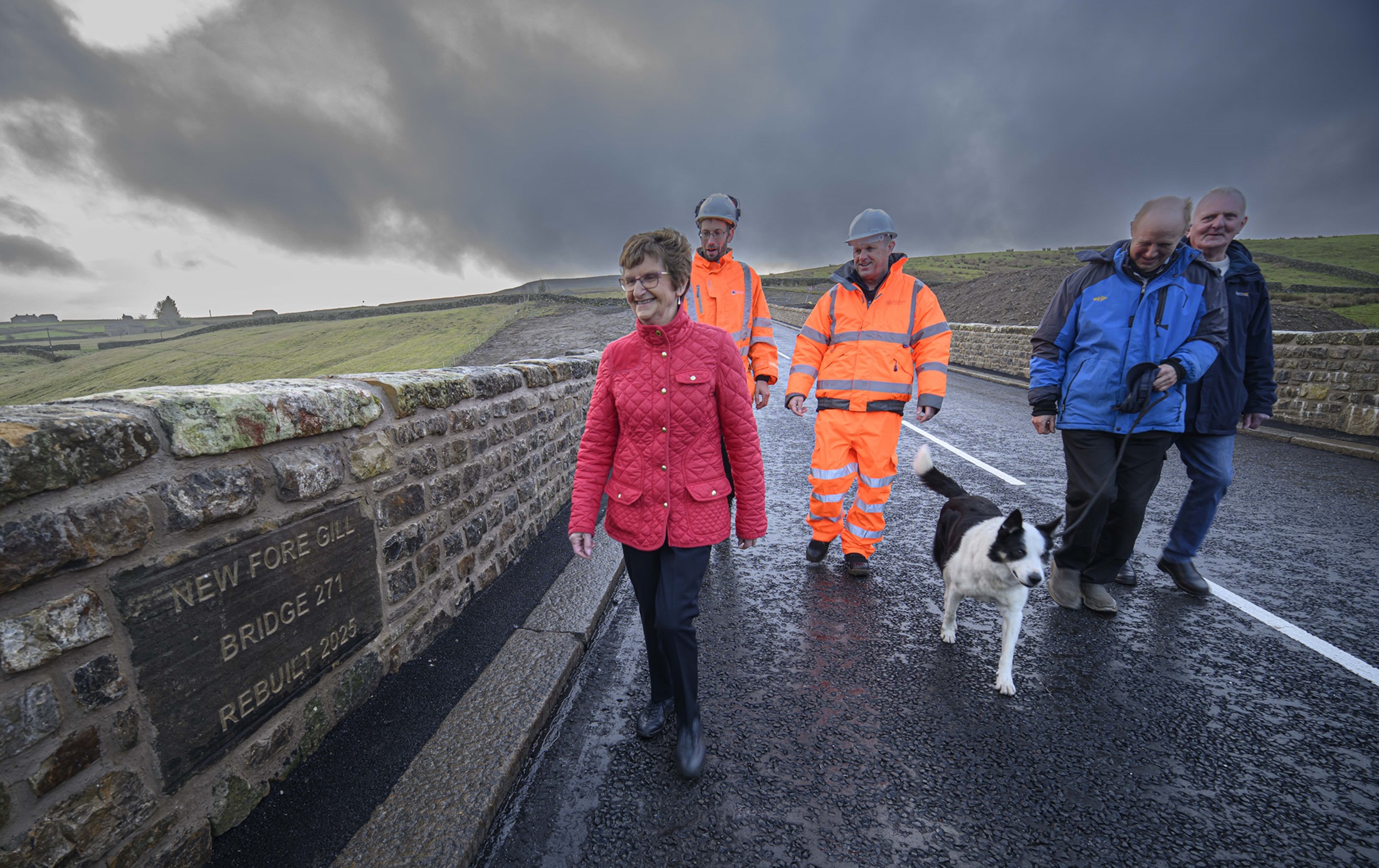 From left, Cllr Yvonne Peacock, head of bridges, Phil Richardson, Cllr Malcolm Taylor, with residents Anthony Hird and Ron Woolford, walking along the new bridge. 
