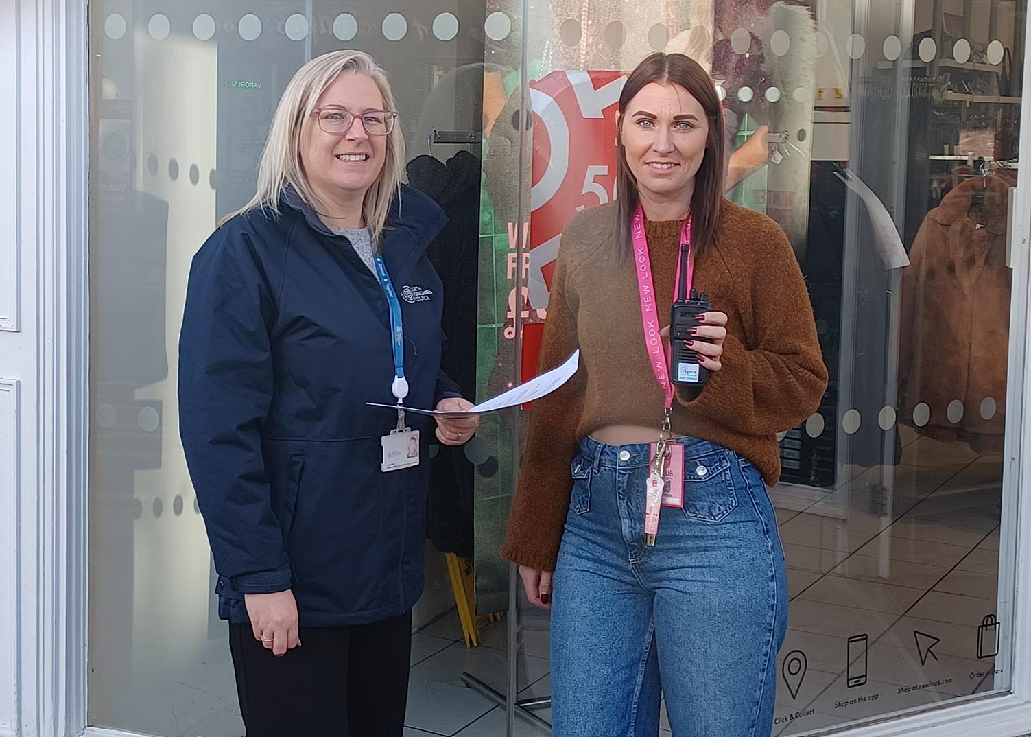 Two ladies stood together