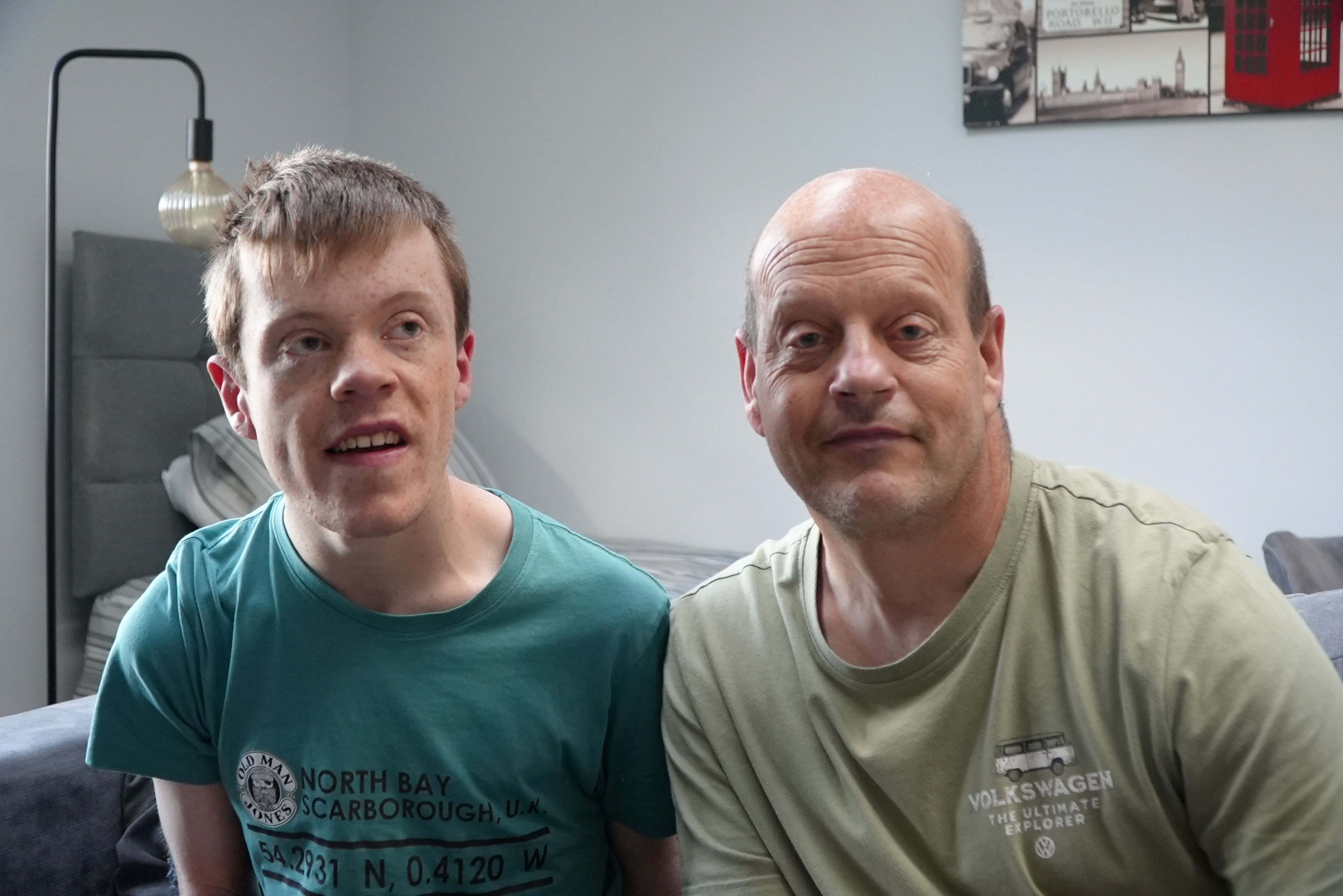 Two men together looking at the camera