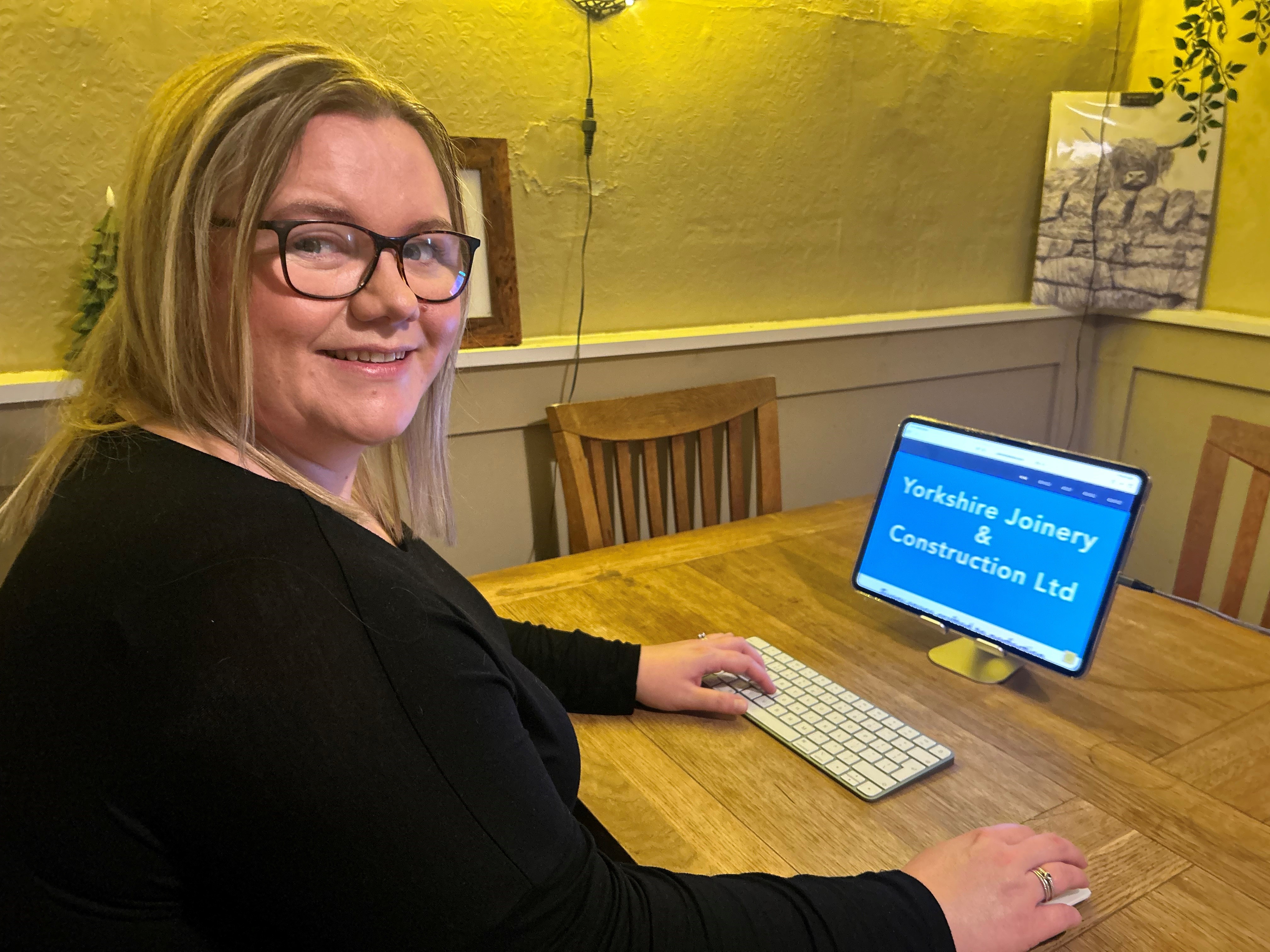 Becky Guy at a computer