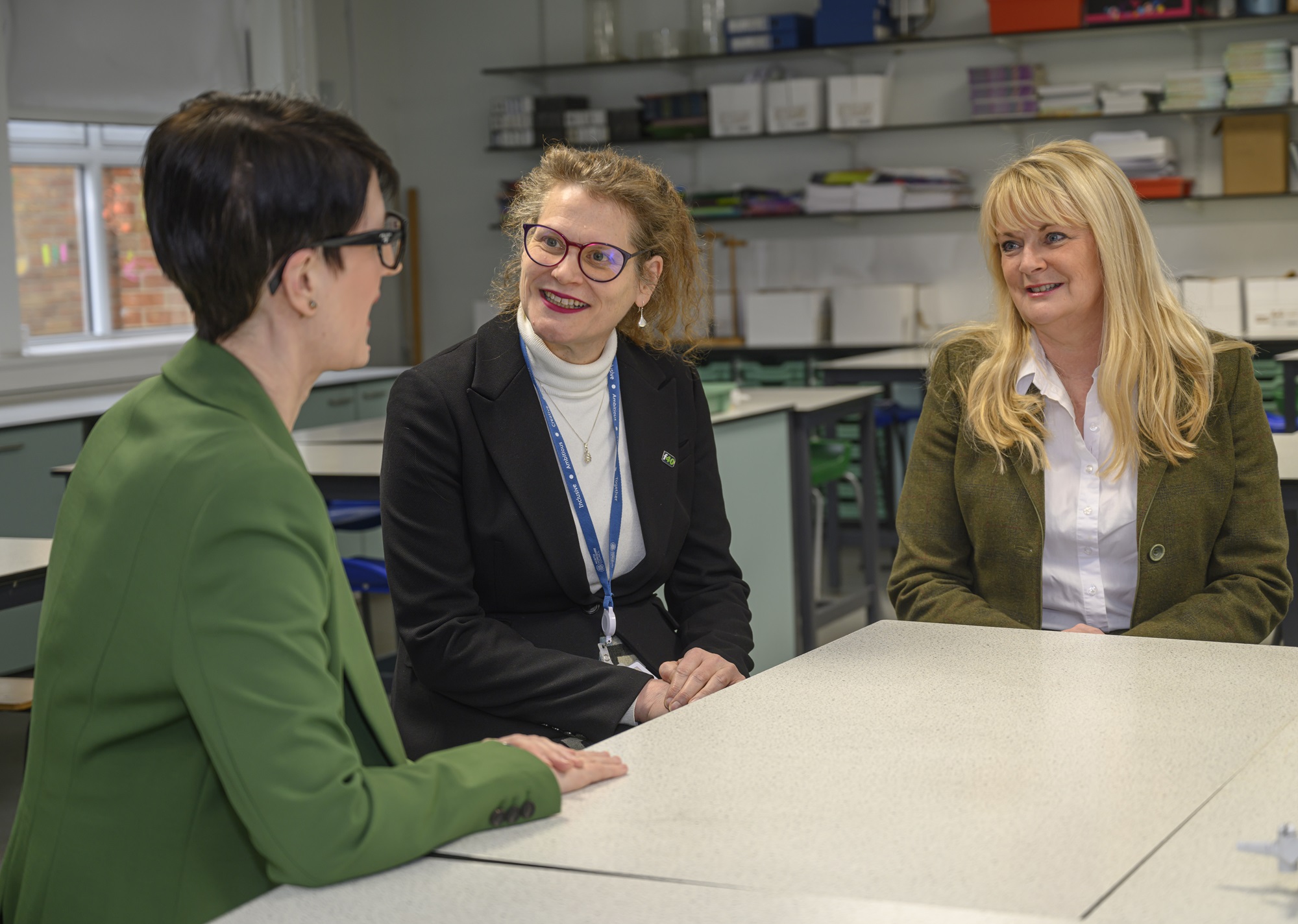 Emma Lambden, El Mayhew and Councillor Annabel Wilkinson discuss low education funding.. 