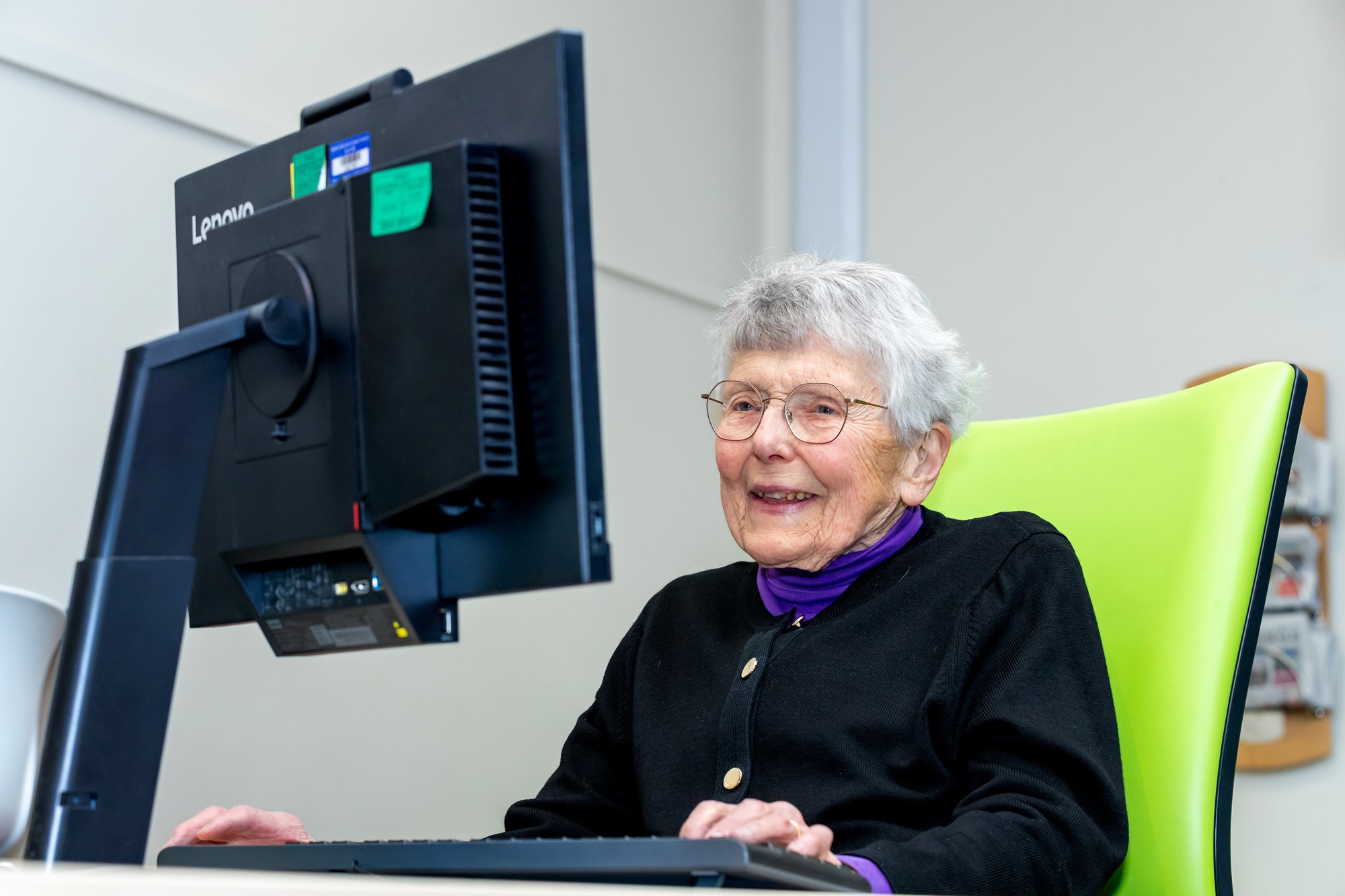 Veronica sat at a computer