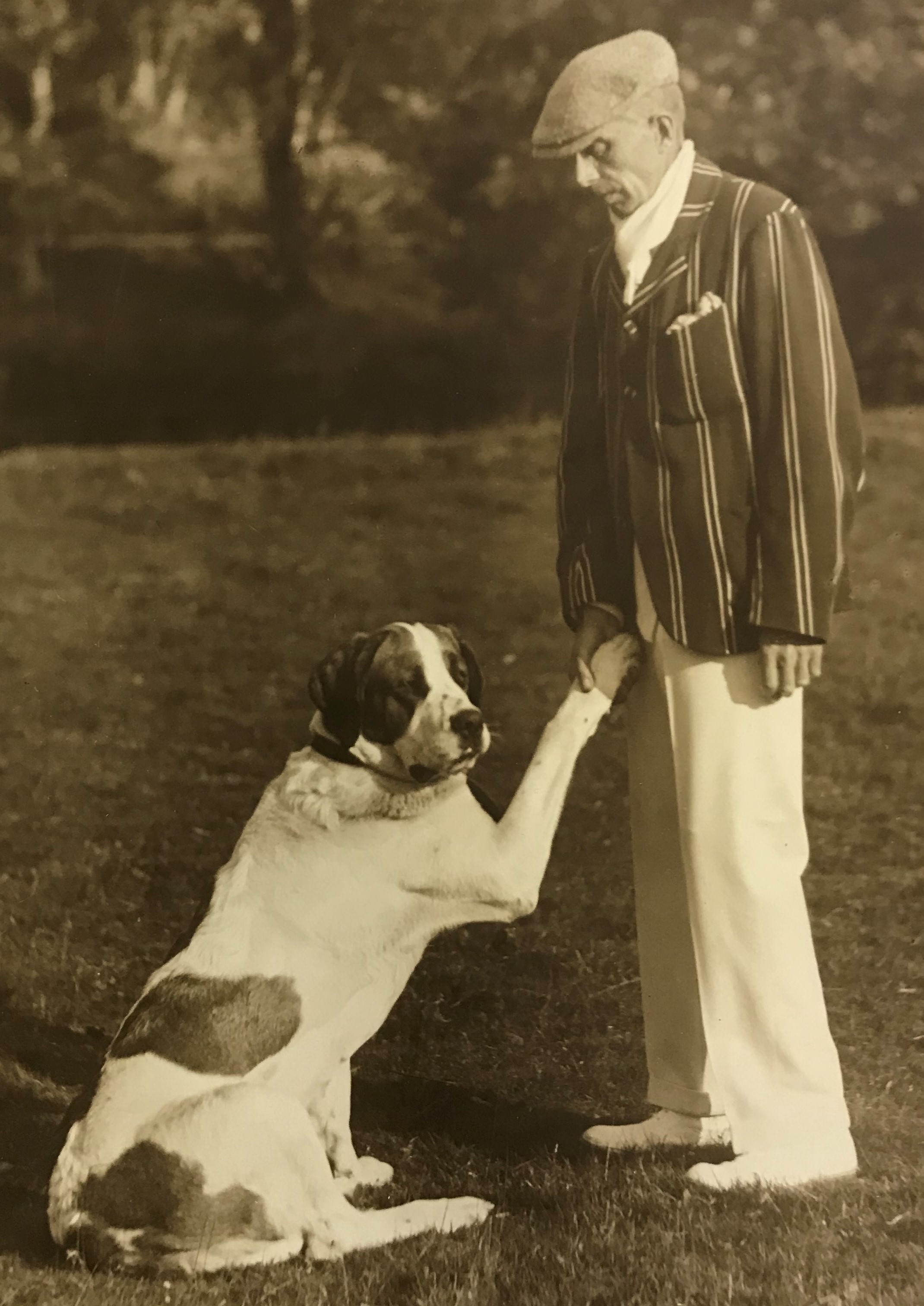 Wilfrid Hall (amateur astronomer) with Pluto the dog (early 20th-century). From the Chaloner (Lord Gisborough) archive.