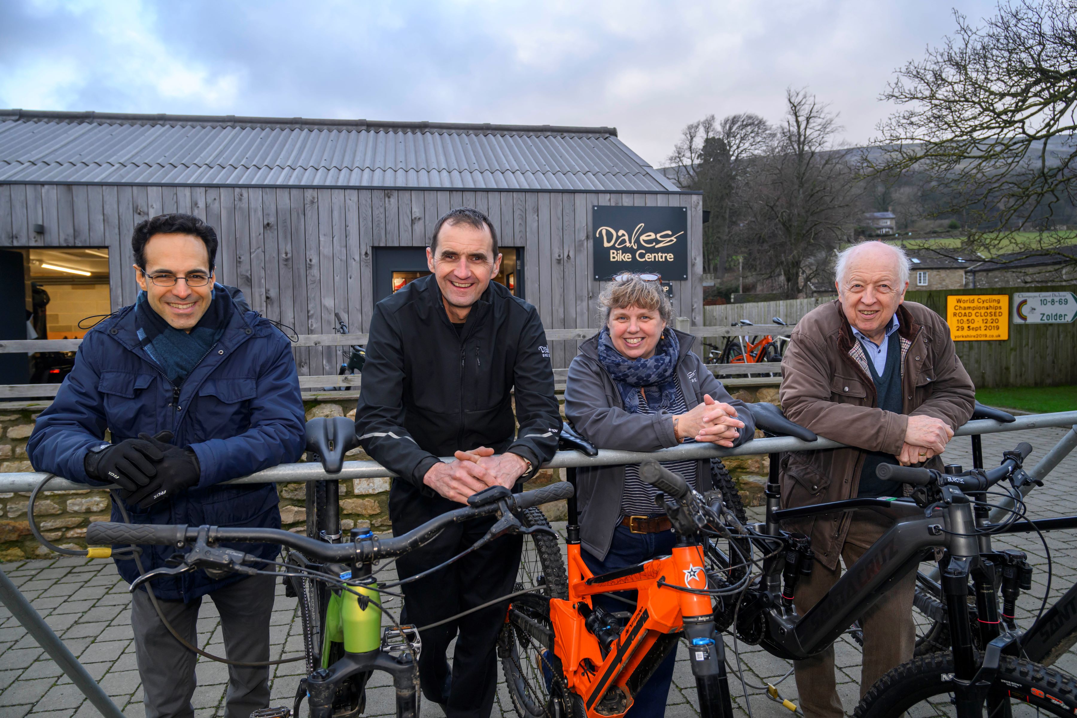 Four people outside the Dales Bike Centre