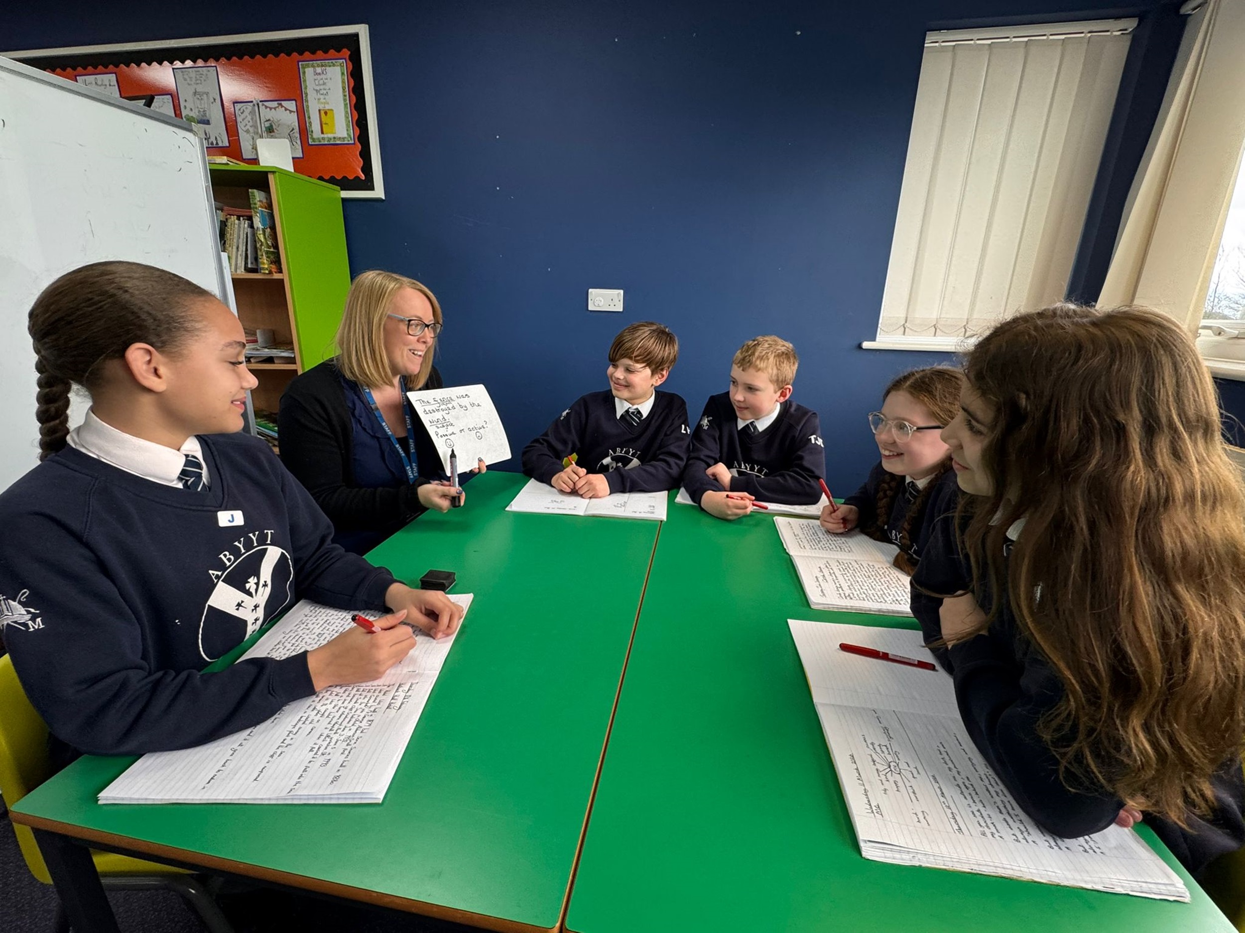 Children sat around a table at St Martins School