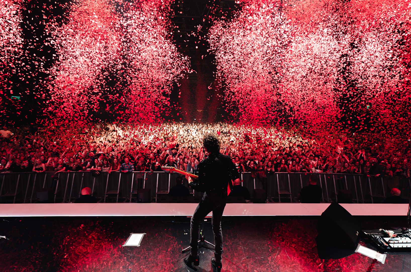 The Kooks on stage playing before a huge audience