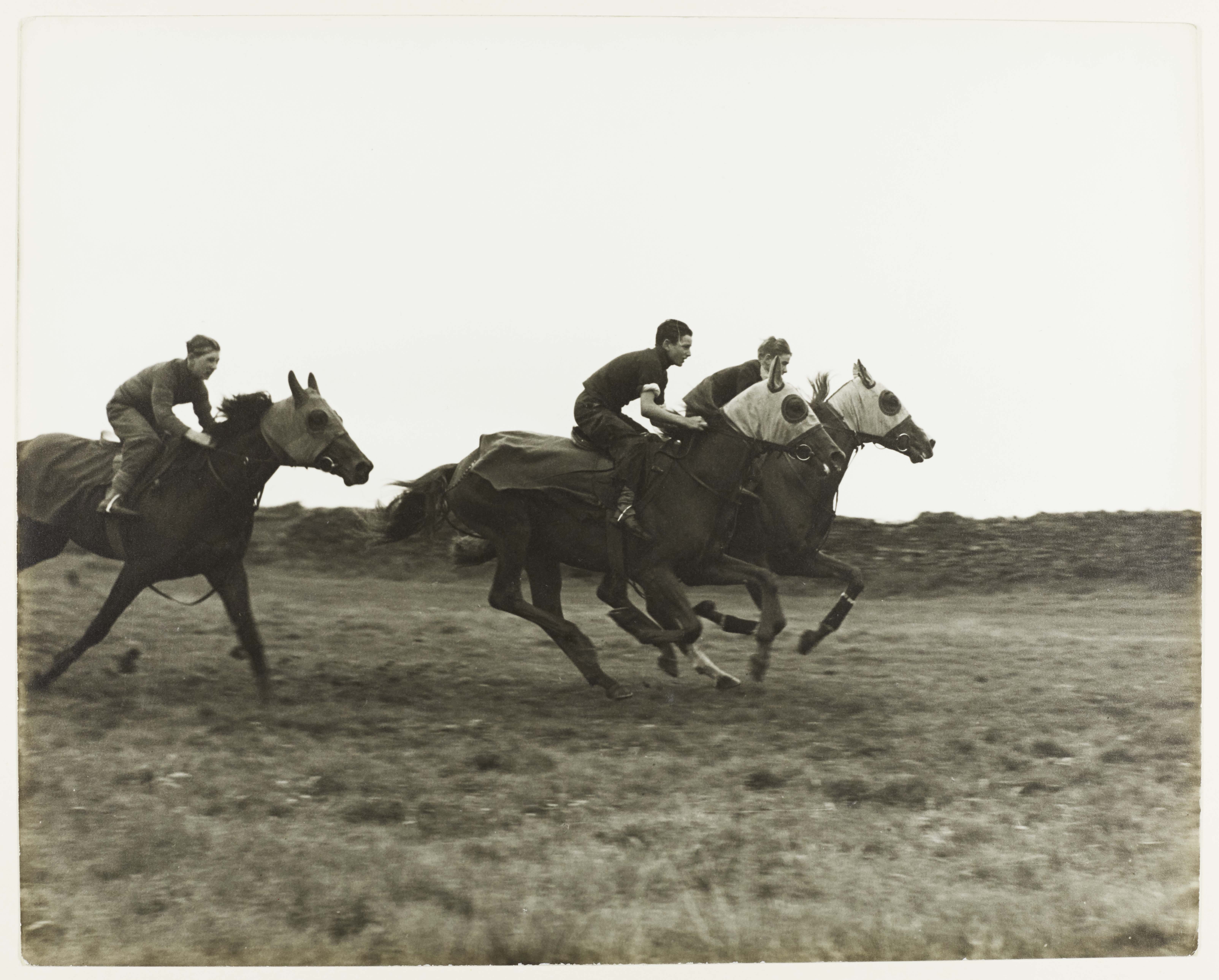 Black and white photo showing a dawn gallop on Richmond Racecourse ,1945. From a collection of British Council photographs within Richmond District Council records.