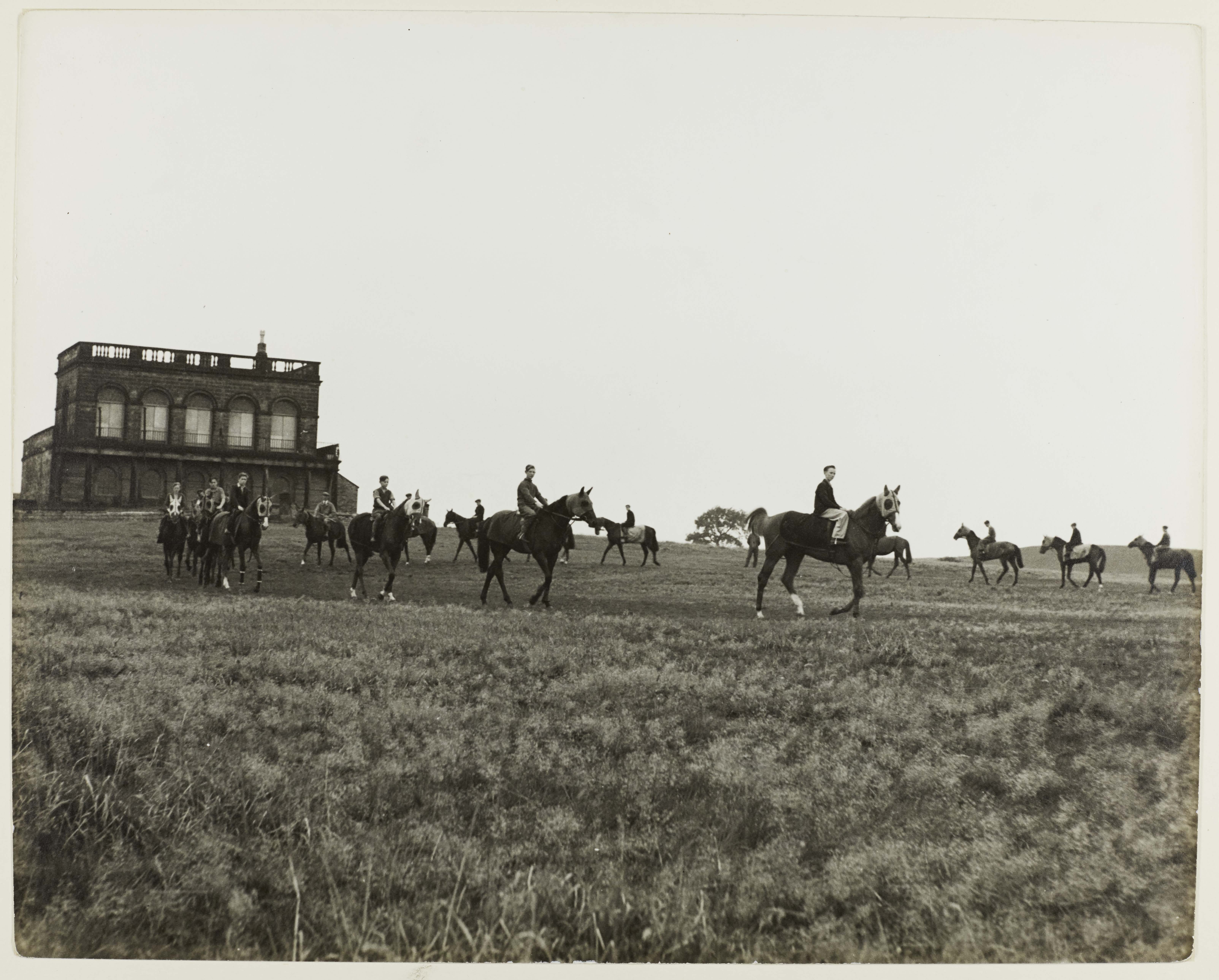 Black and white photo of Richmond Racecourse showing the Grandstand, 1945. From a collection of British Council photographs within Richmond District Council records.