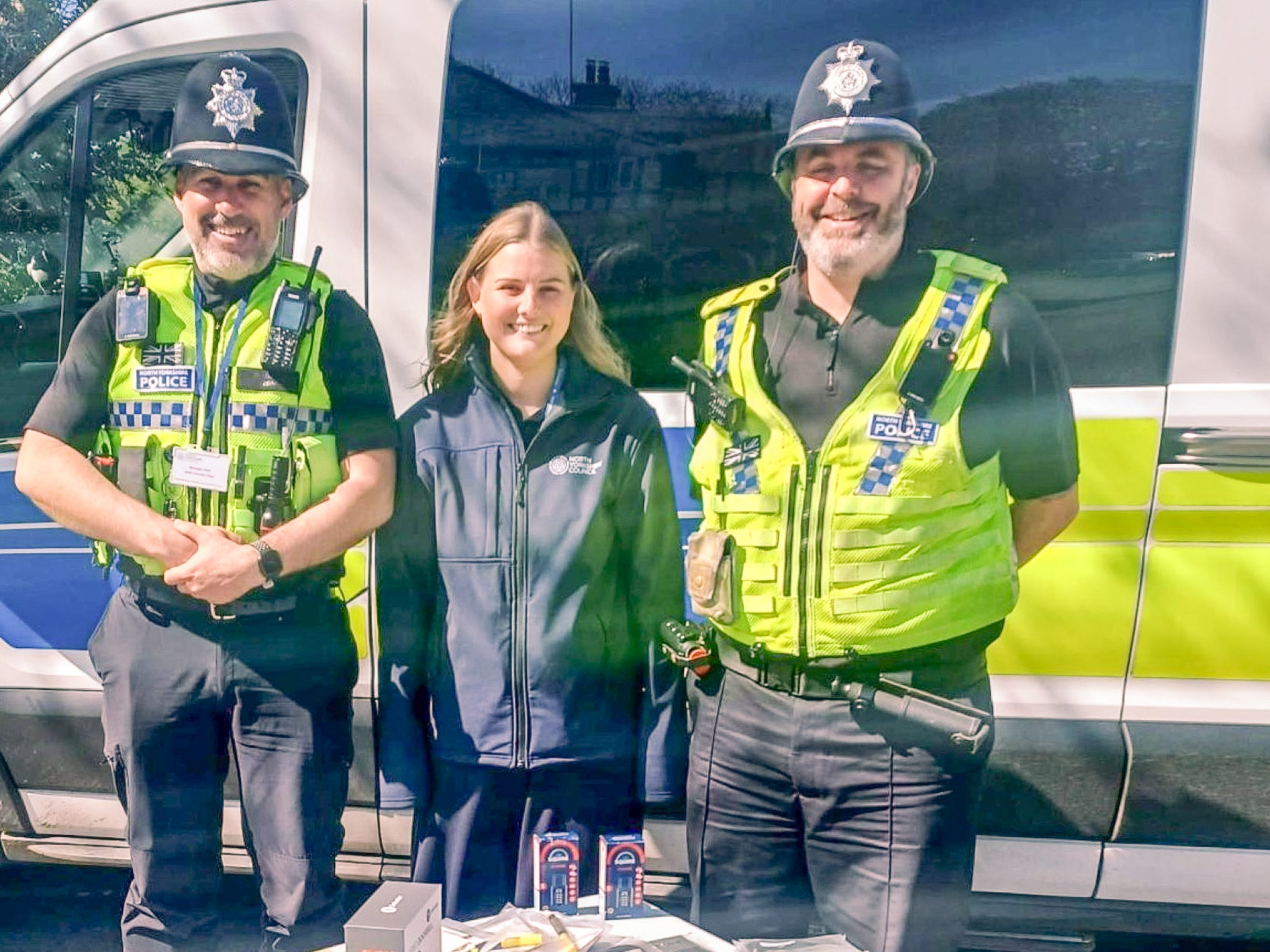 North Yorkshire Council community safety officer, Elen Hughes, with North Yorkshire Police officers Pierre Olesqui and Brendan Firth at a community event promoting the work the service does.
