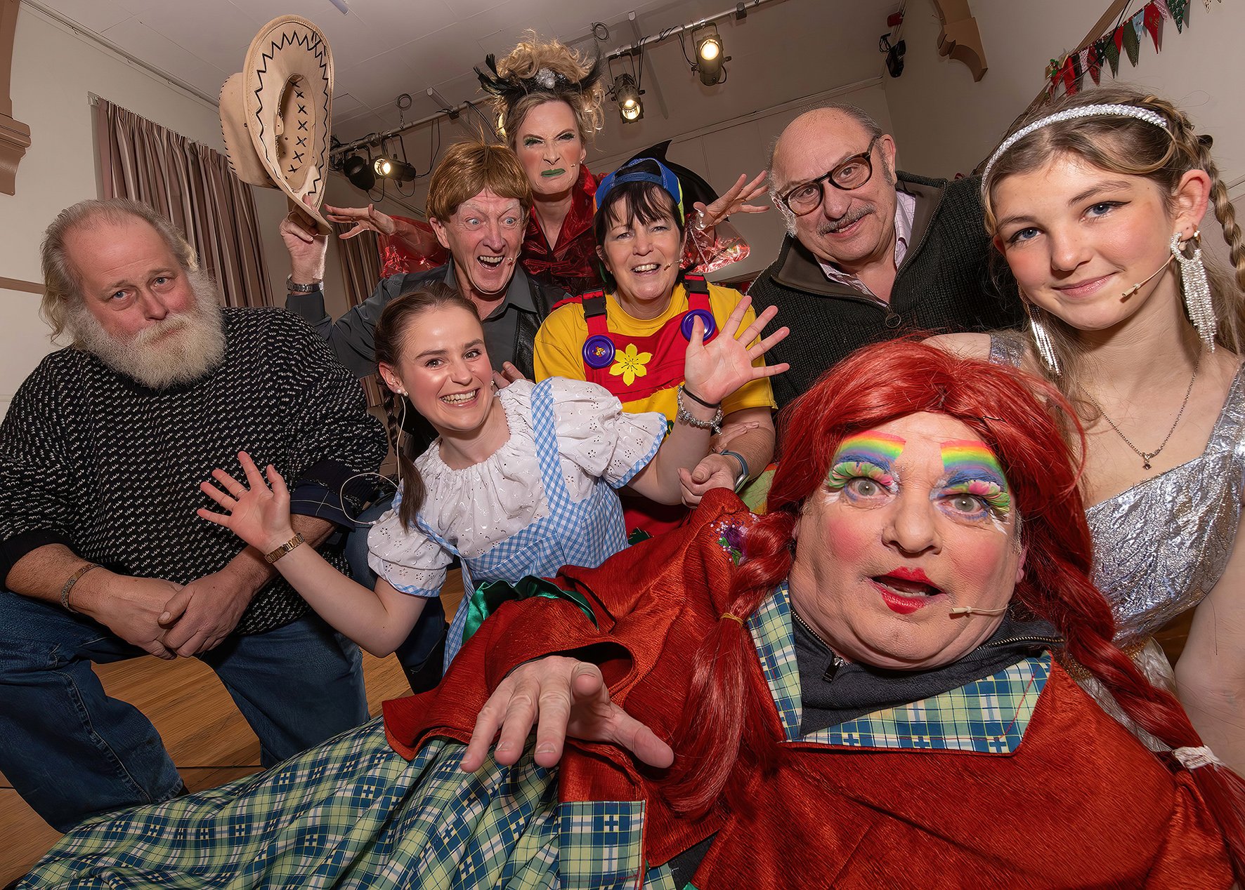 Cllr Arnold Warneken (left) and Cllr Andy Paraskos (right) with Tockwith Players in their Wizard of Wilstrop pantomime costumes and wearing their new headset mics, (from left) Sandra Adlington, Geoff Farnworth, Karen Coombes, Sue Corbett, David Hardman and Ellie Triffitt.