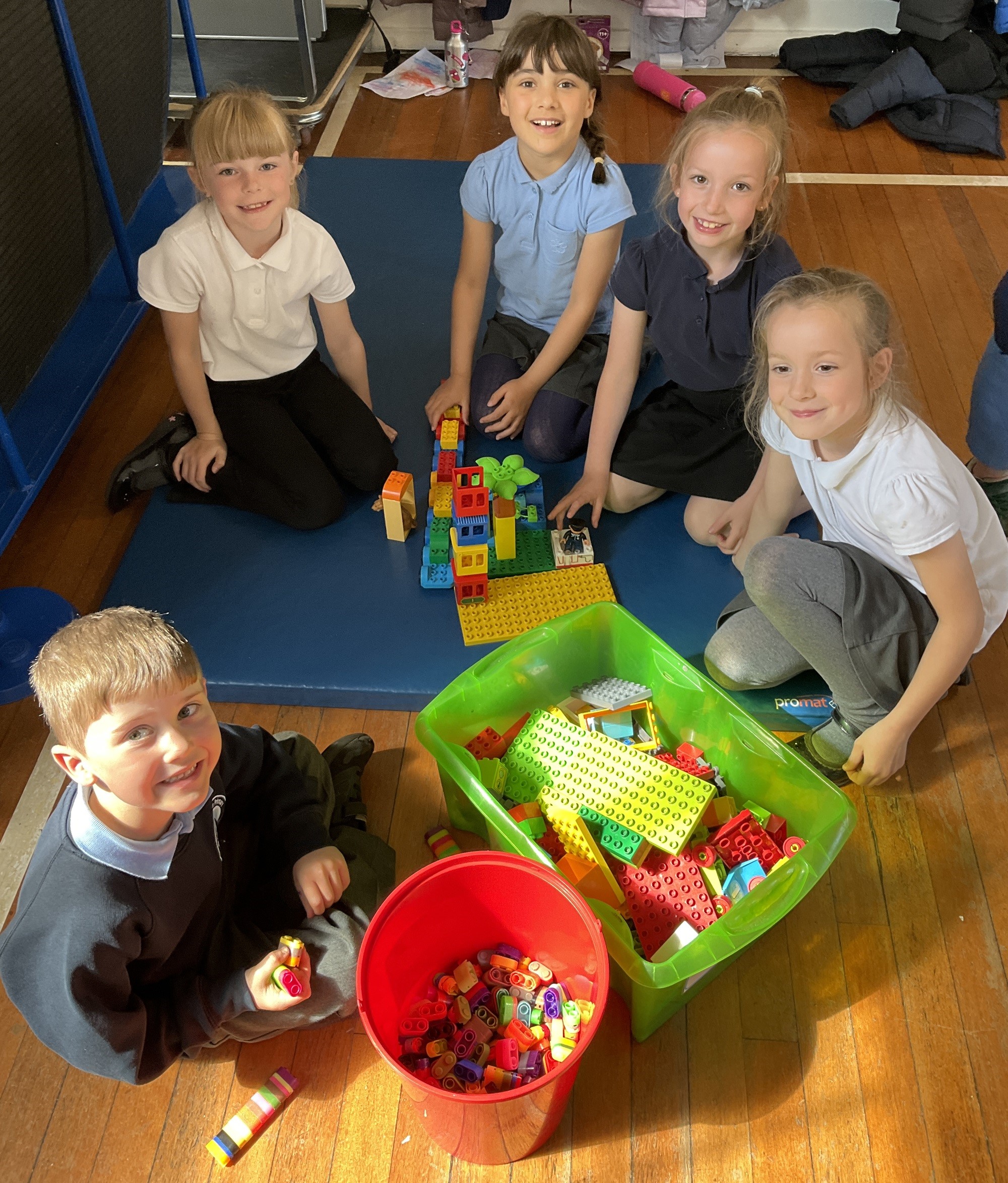 School children in a circle playing