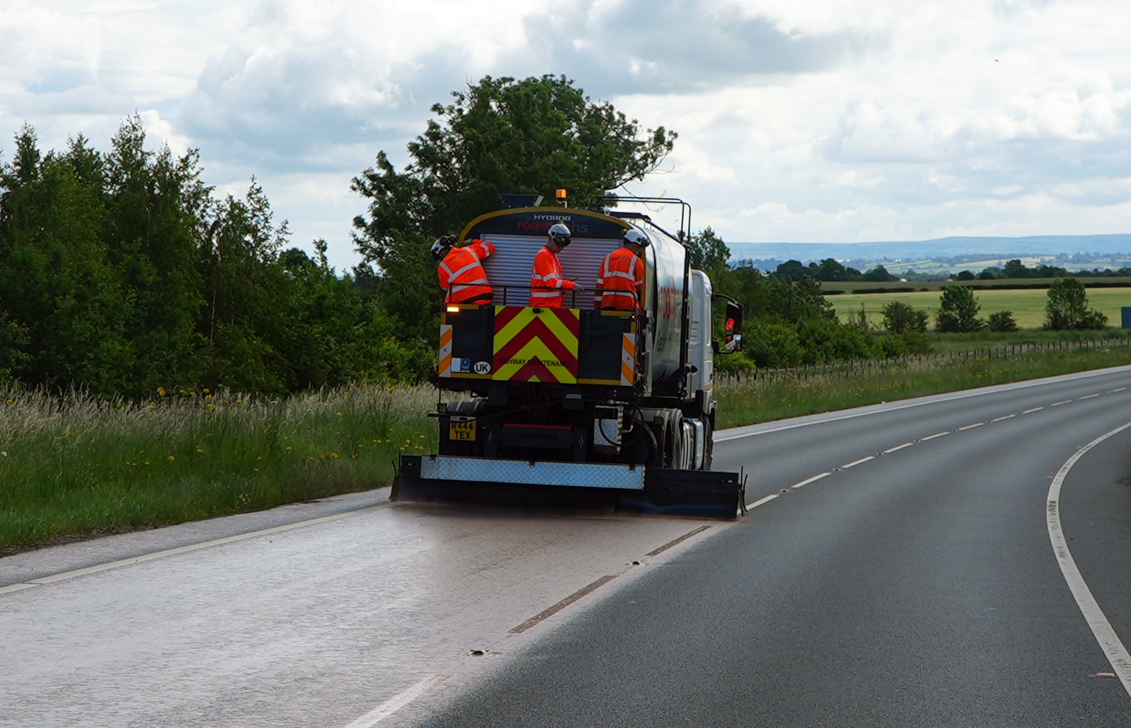A new highways treatment being applied to the road