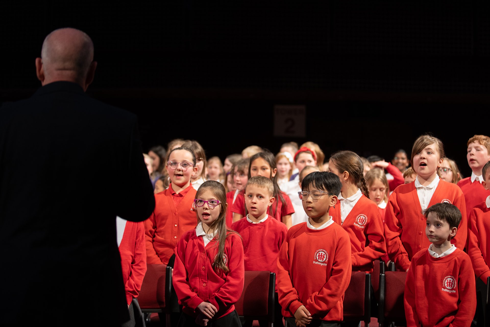 A group of children singing