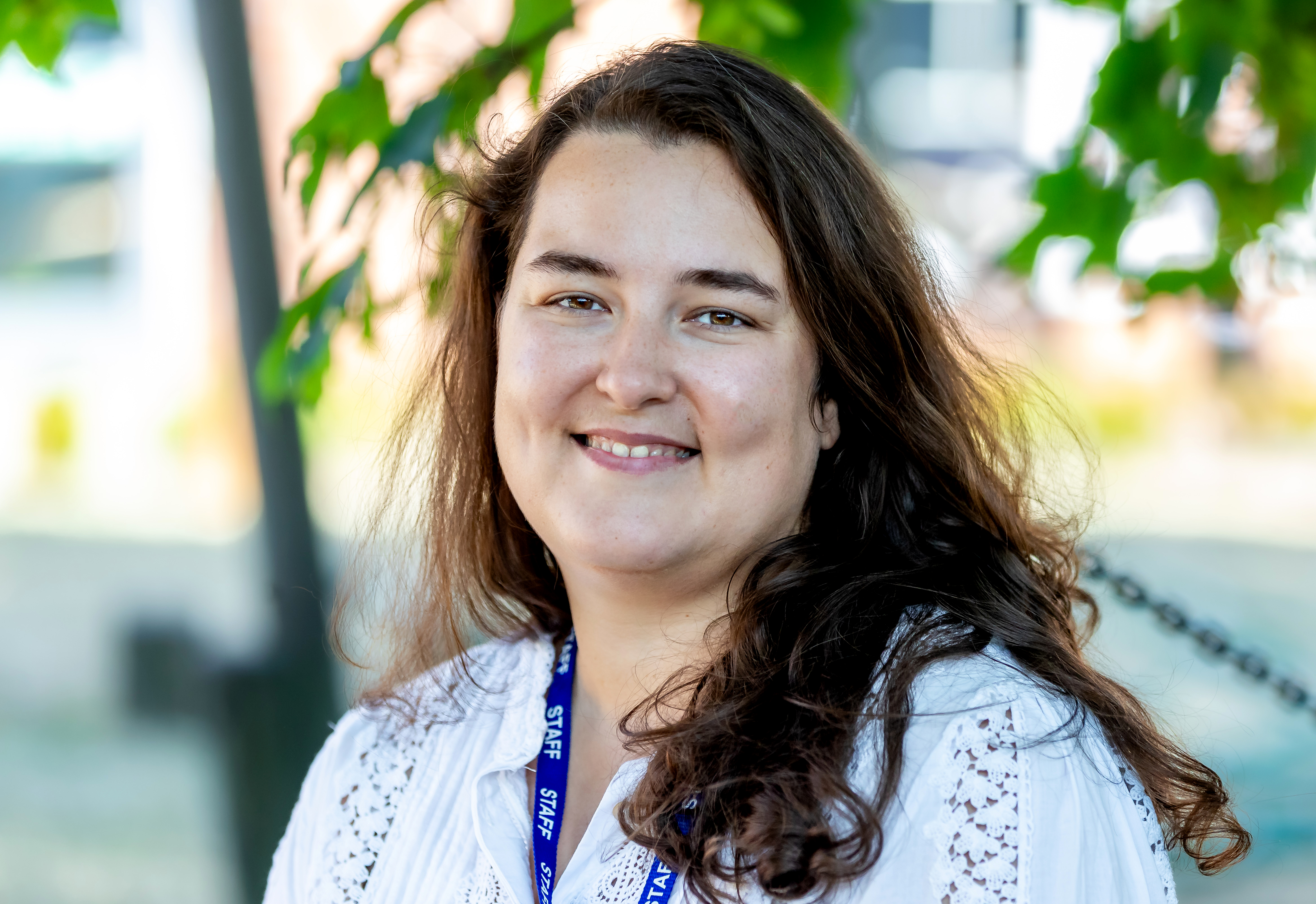 Photo of Olha Honcharuk standing outside smiling at the camera