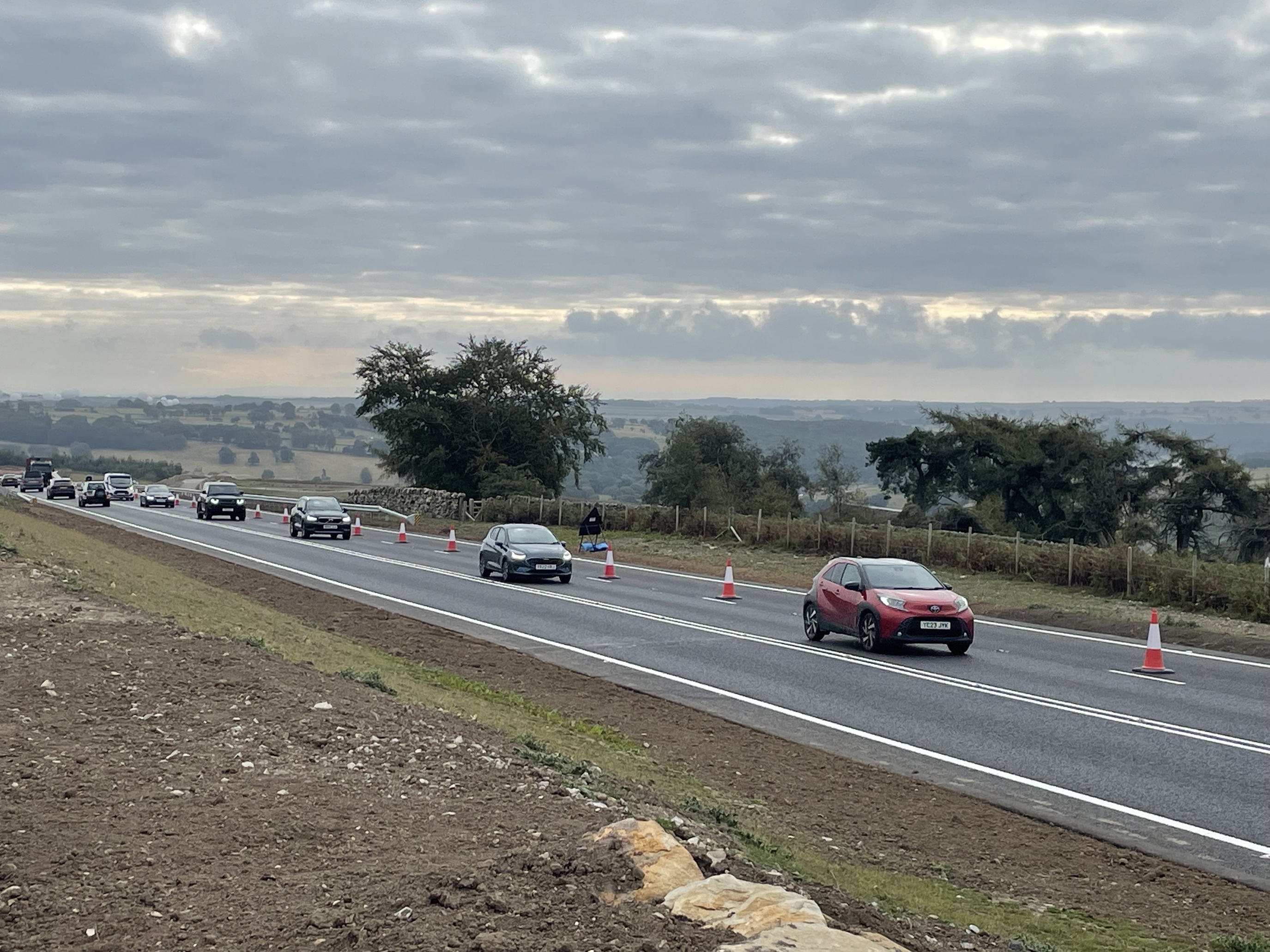 Traffic is pictured travelling along the new stretch of the A59 at Kex Gill today (Tuesday, August 25). The route is seen as one of the most strategically important highways in the country linking the east and west of England.