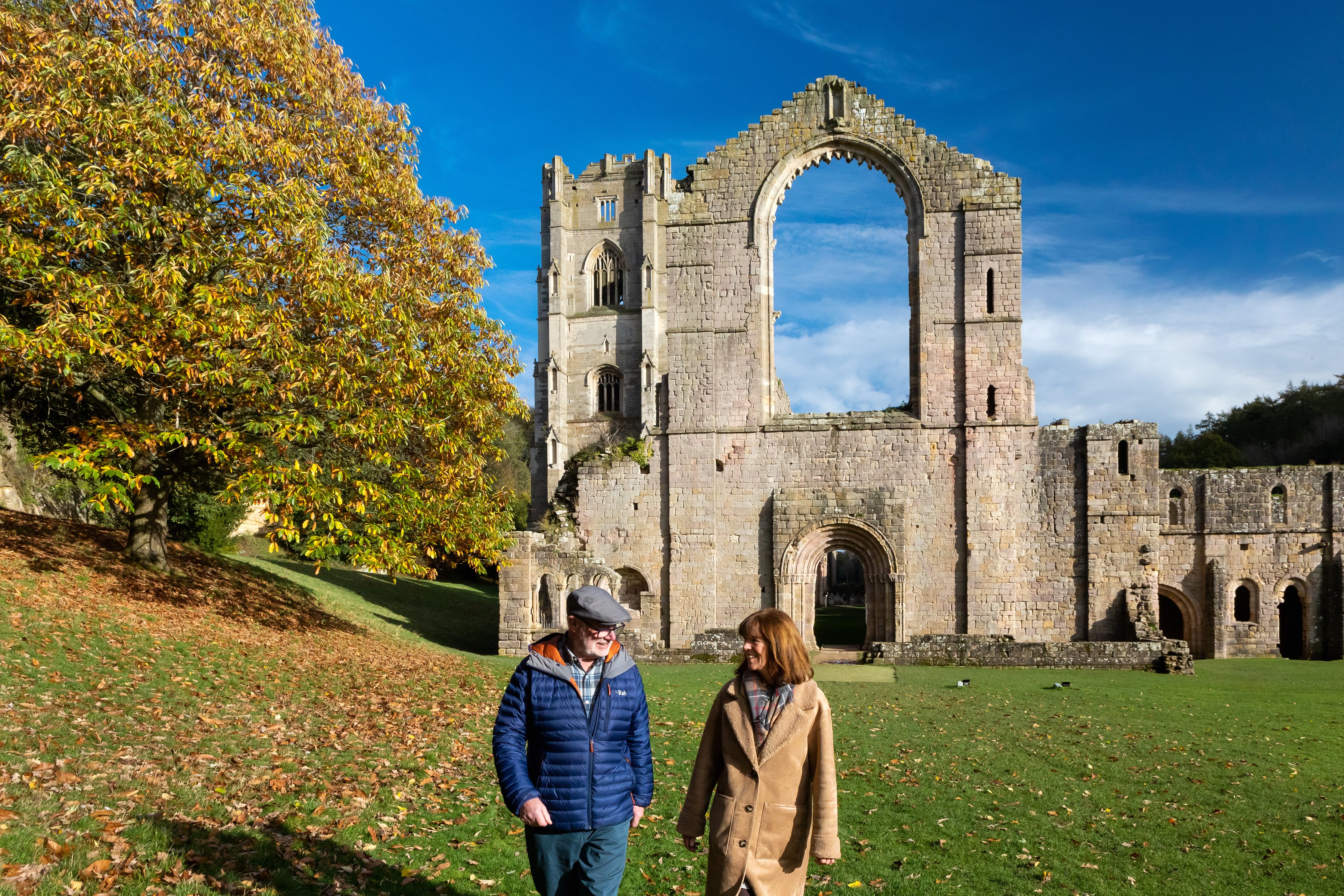 Couple walking at Fountains Abbey
