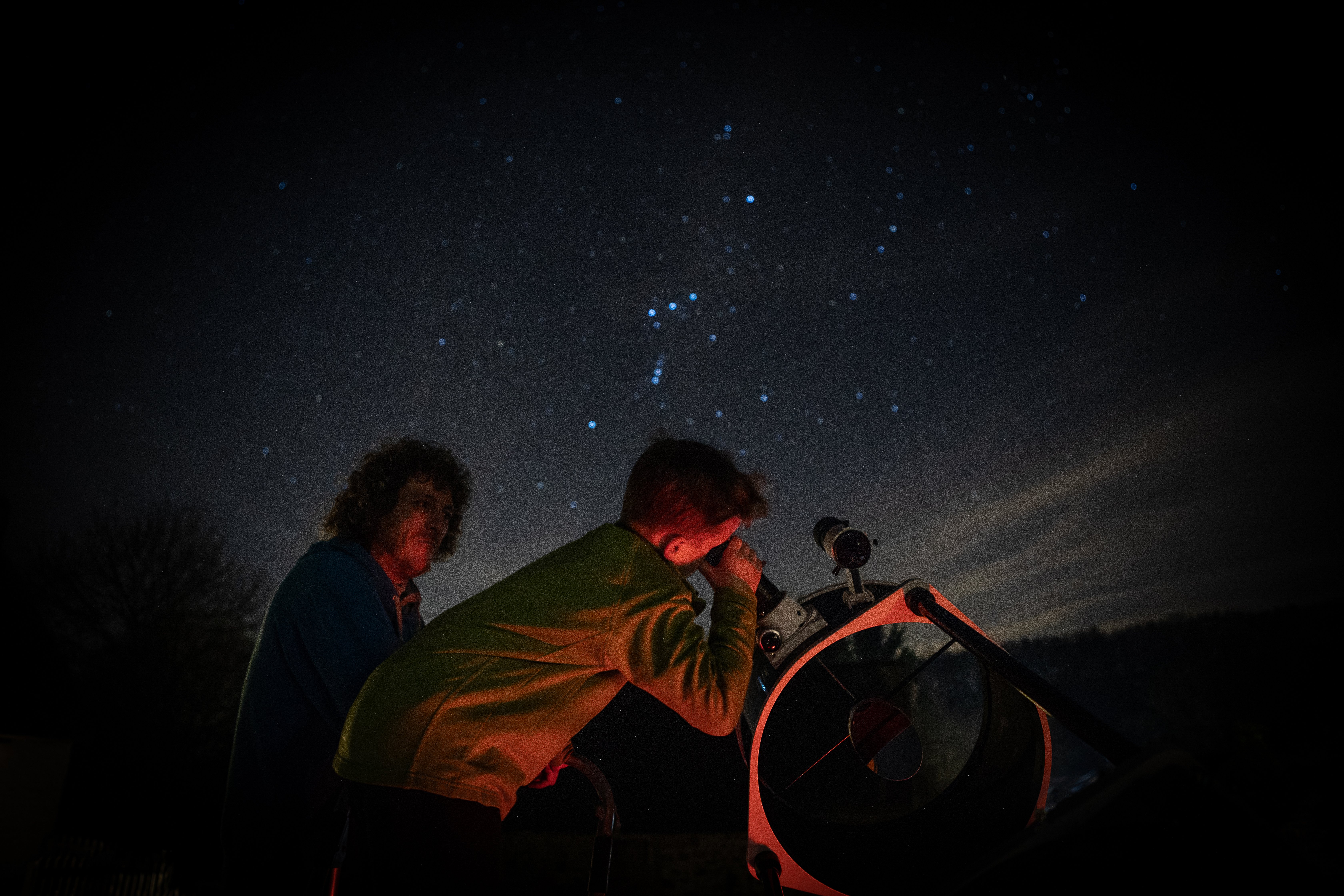 Two people stargazing