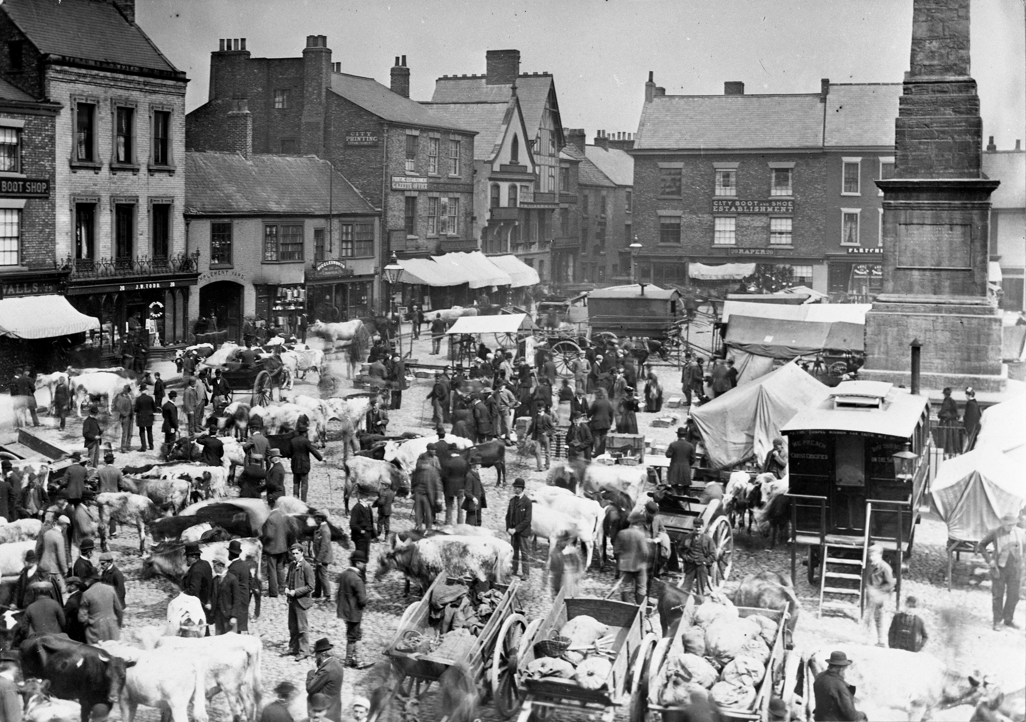 June fair and cattle mart showing the Church Army wagon, Ripon Market Place, 1894. This image is part of the Ripon Re-Viewed collection created by Ripon Civic Society and supported by the National Lottery Heritage Fund (NLHF)