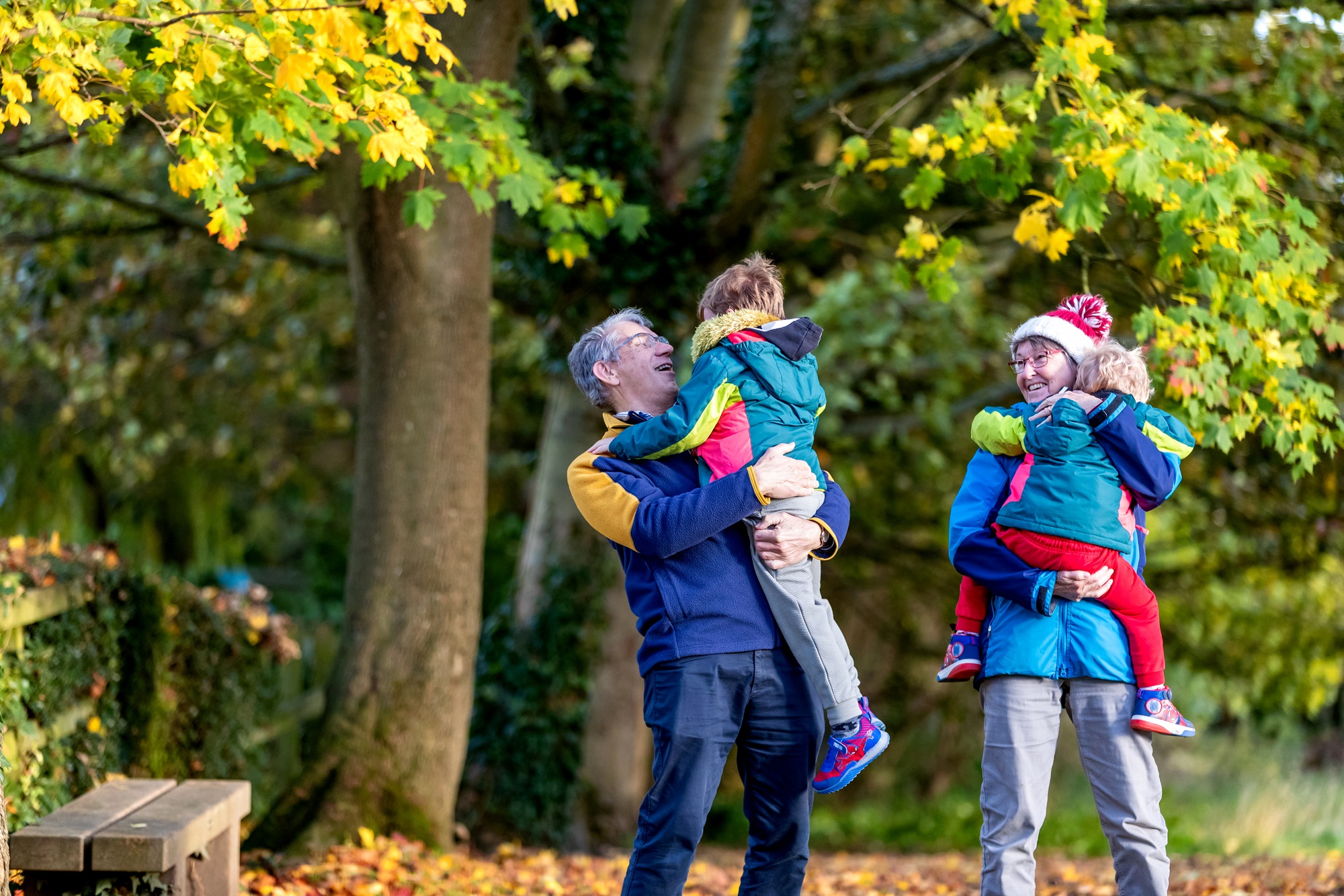 A family of four in the woods