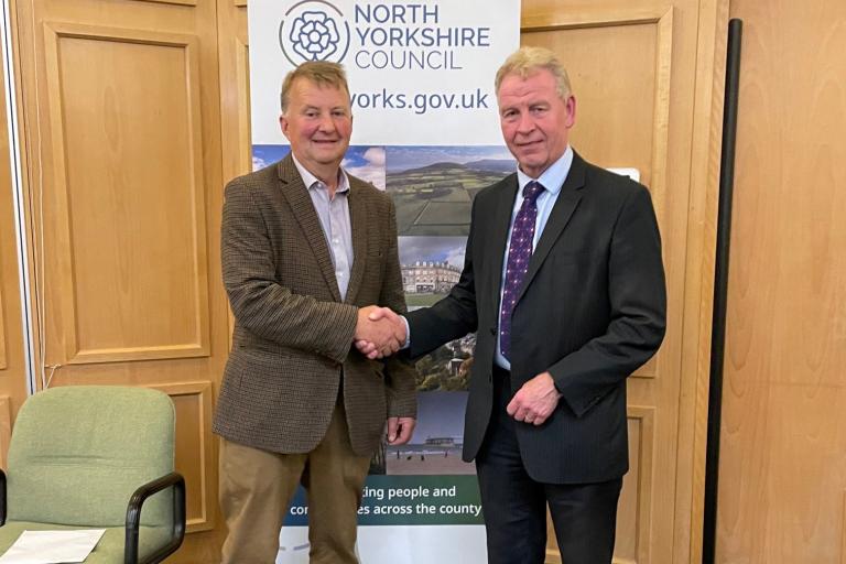 Conservative party candidate, David Hugill (left), who has become the new member for the Hutton Rudby and Osmotherley seat, with chief executive of North Yorkshire Council and returning officer, Richard Flinton. 
