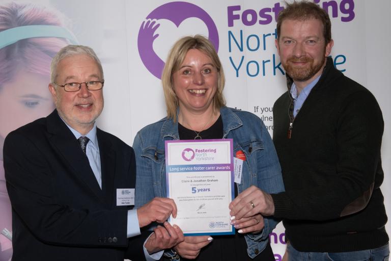 Claire and Jonathan Graham were honoured for their five years of fostering service.