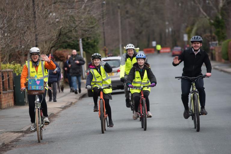 A group of people on bikes