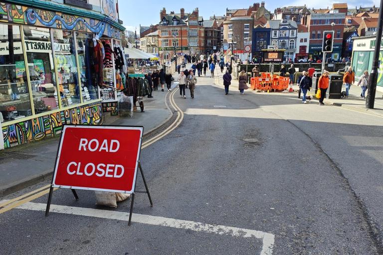 A road closed sign next to Whitby Swing Bridge