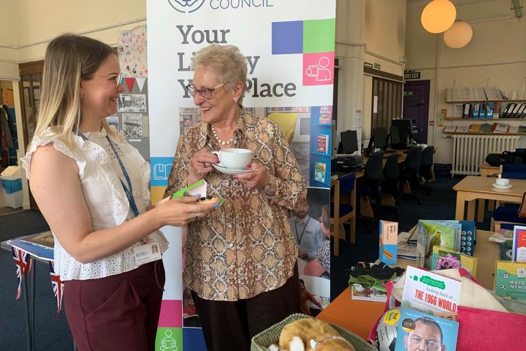 Area librarian Catherine Barlow (left), and library visitor Enid Cheetham. 