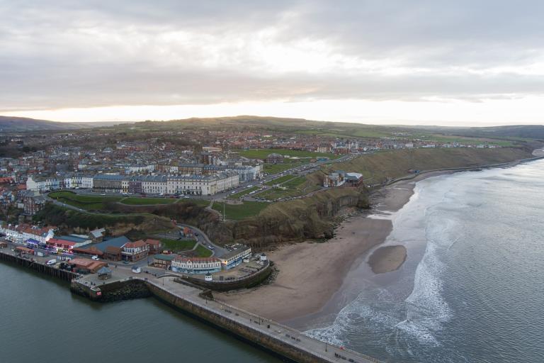 An aerial shot of Whitby’s coastline. A consultation is under way on the future of the cliff lift replacement bus service. 