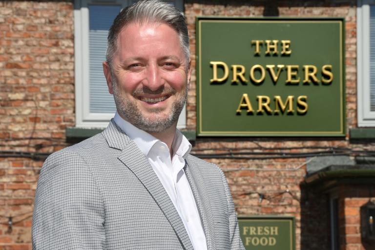 A man outside The Drovers Arms