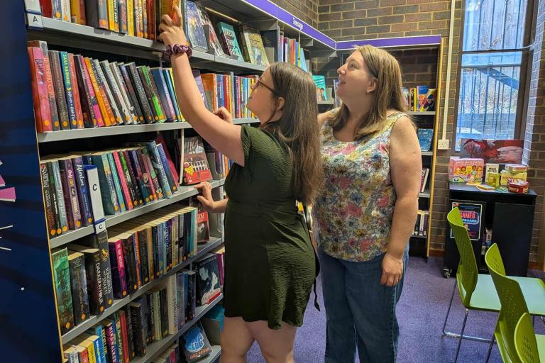 Kaitlin and Liz Clarkson in the library