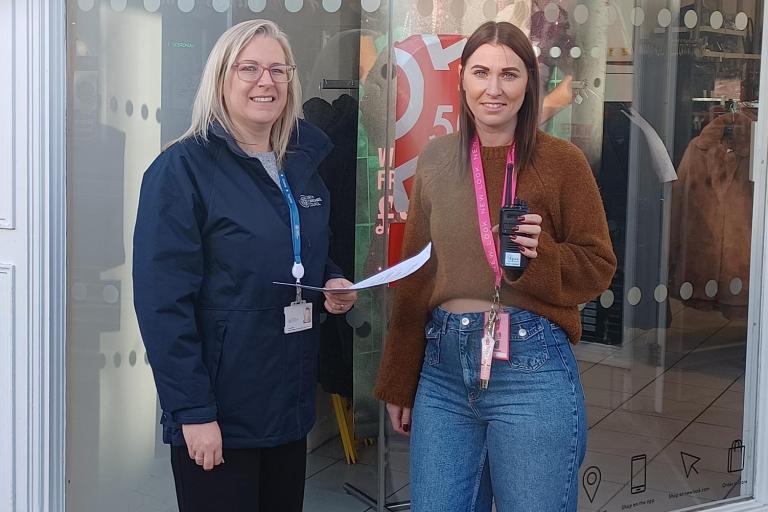 Two ladies stood together